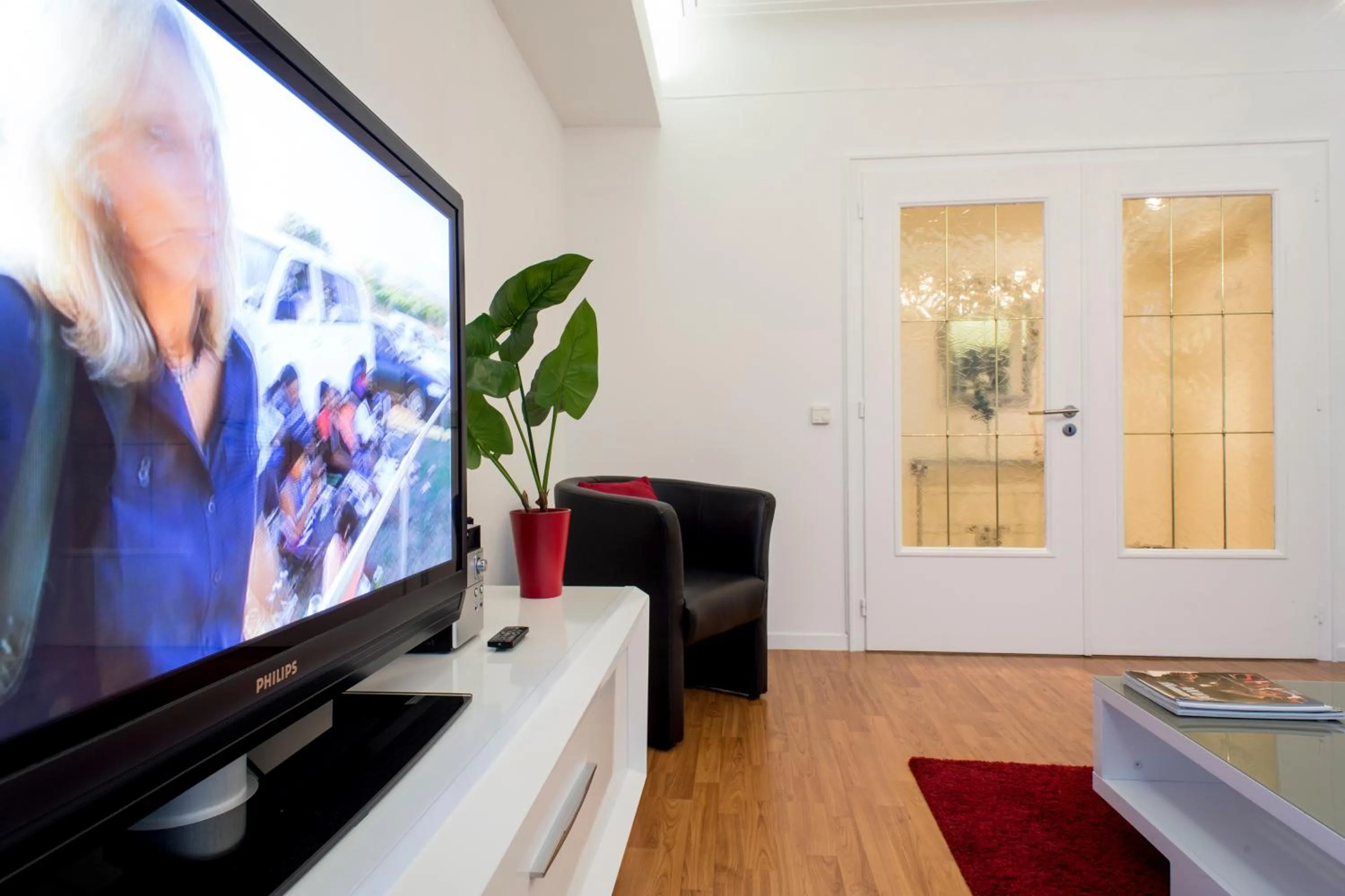 TV and multimedia in The Queen Luxury Apartments - Villa Carlotta