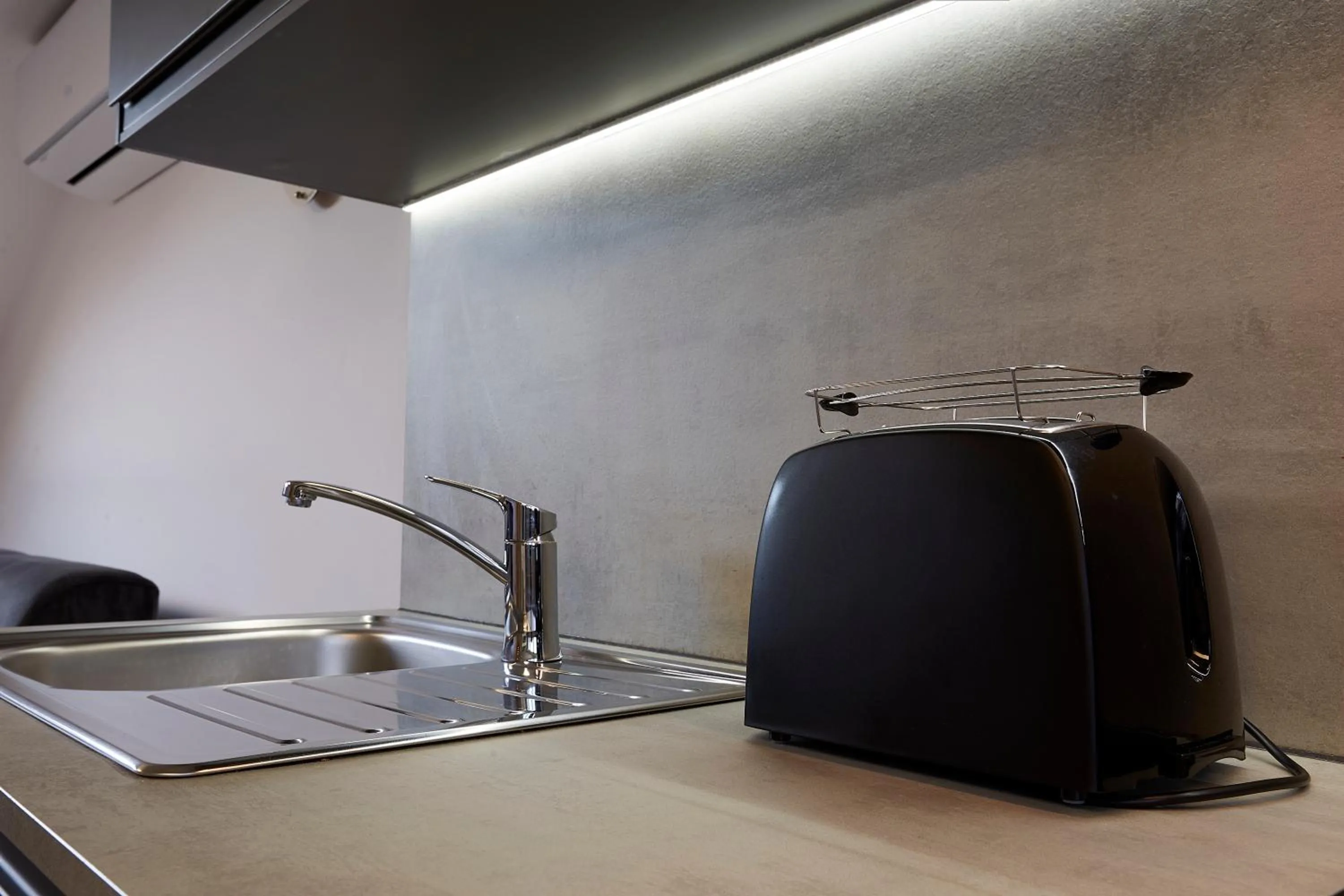 toaster in The Queen Luxury Apartments - Villa Carlotta