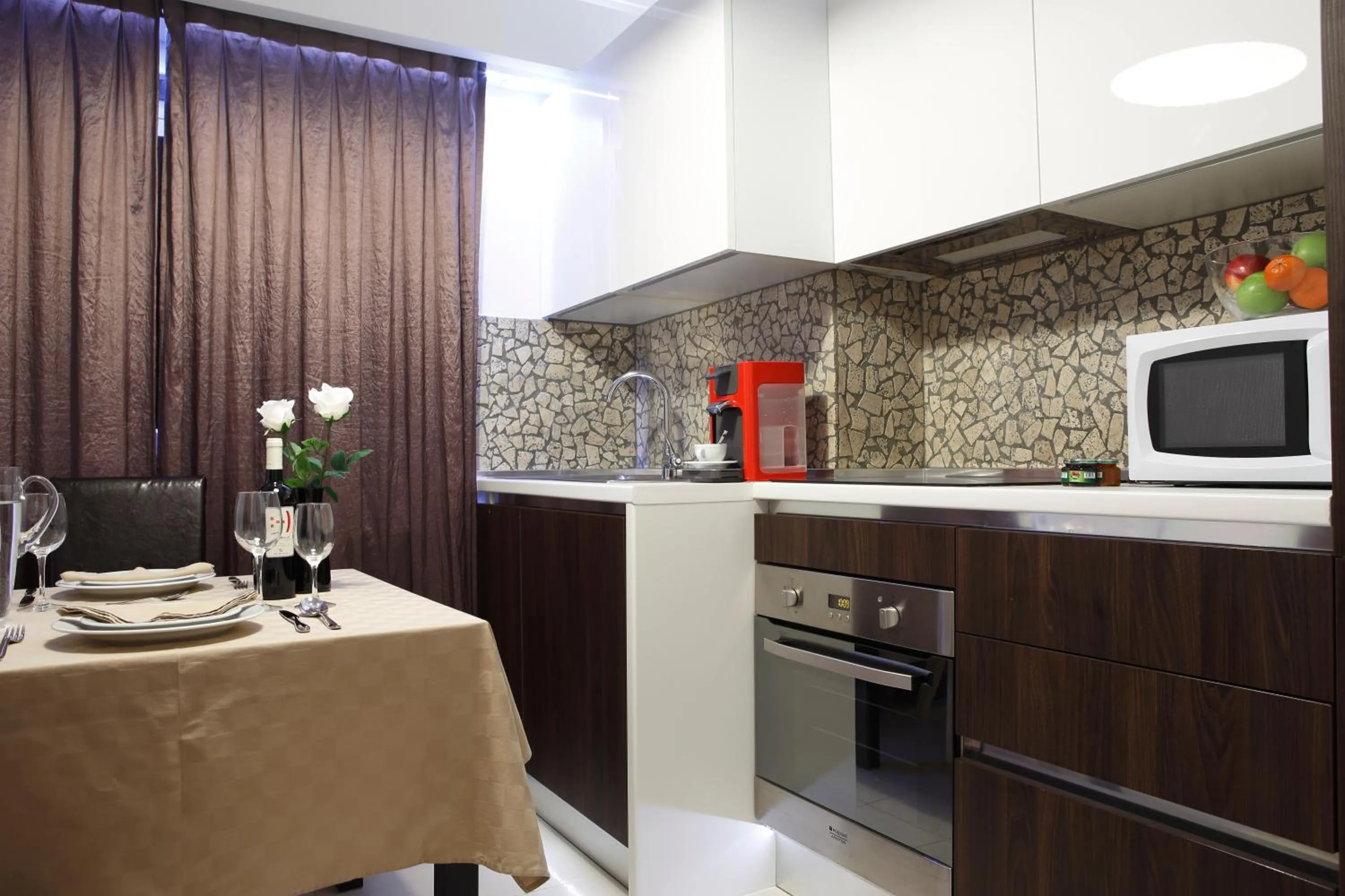 Kitchen or kitchenette in The Queen Luxury Apartments - Villa Carlotta