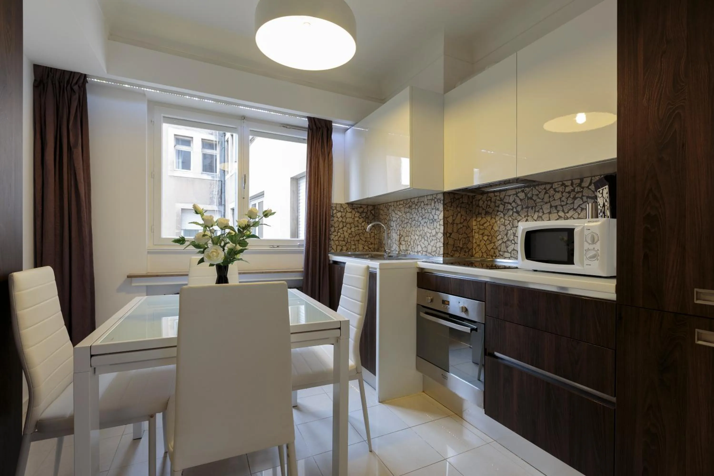 Kitchen or kitchenette in The Queen Luxury Apartments - Villa Carlotta