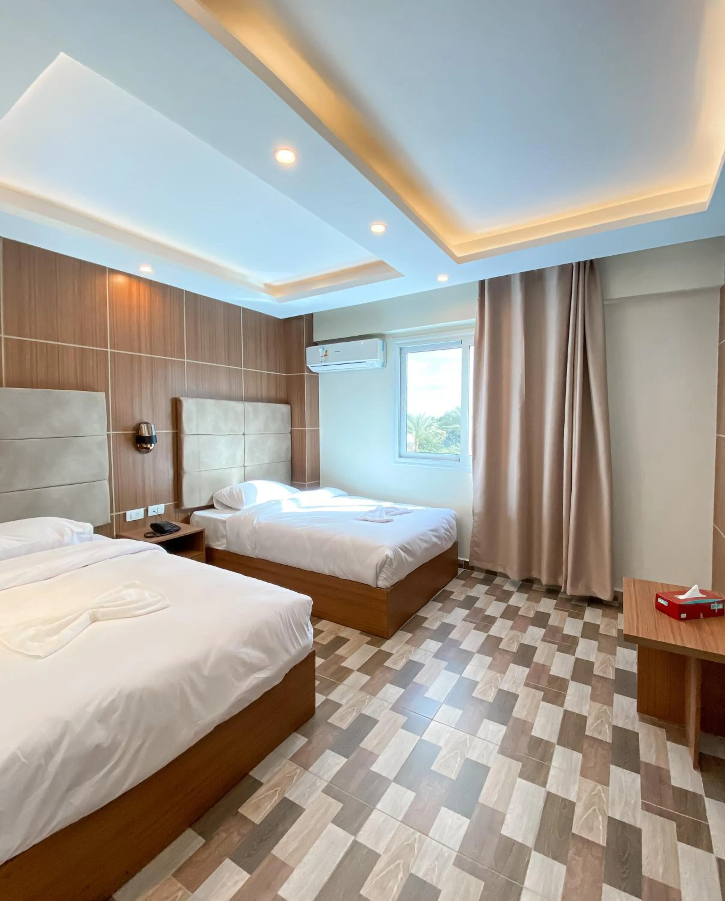 Bed in Nine Pyramids View Hotel