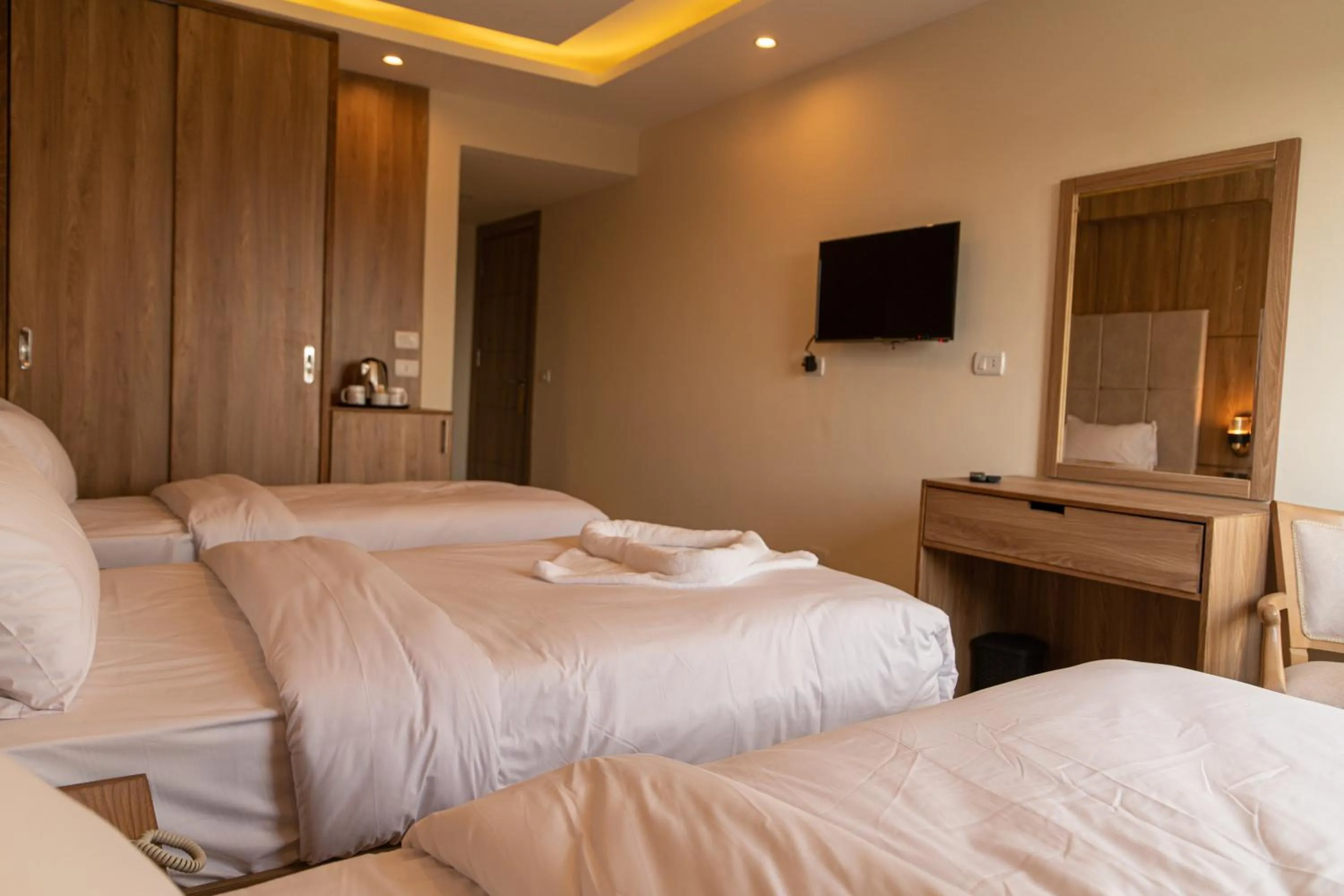 Bed in Nine Pyramids View Hotel