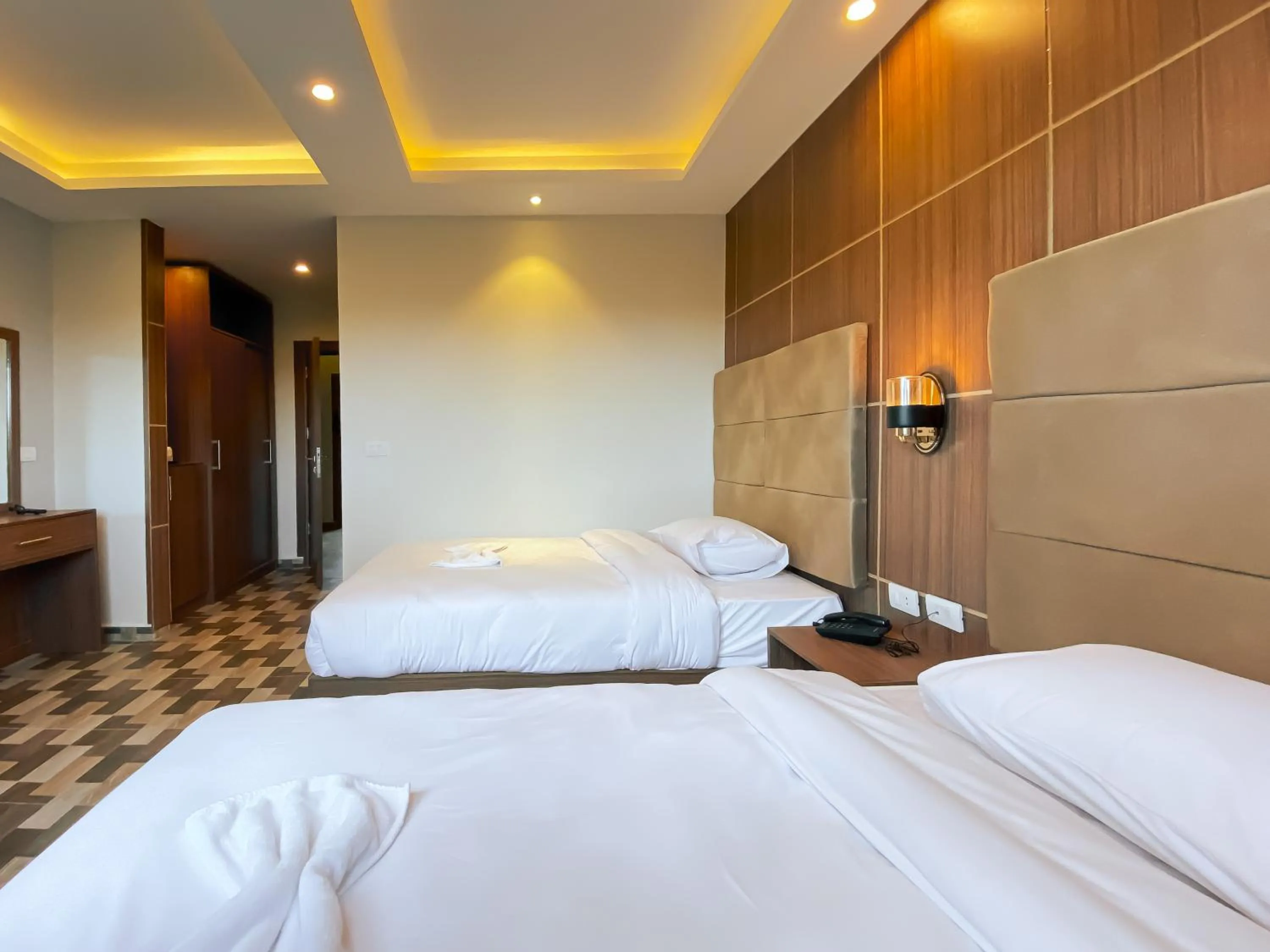 Bed in Nine Pyramids View Hotel