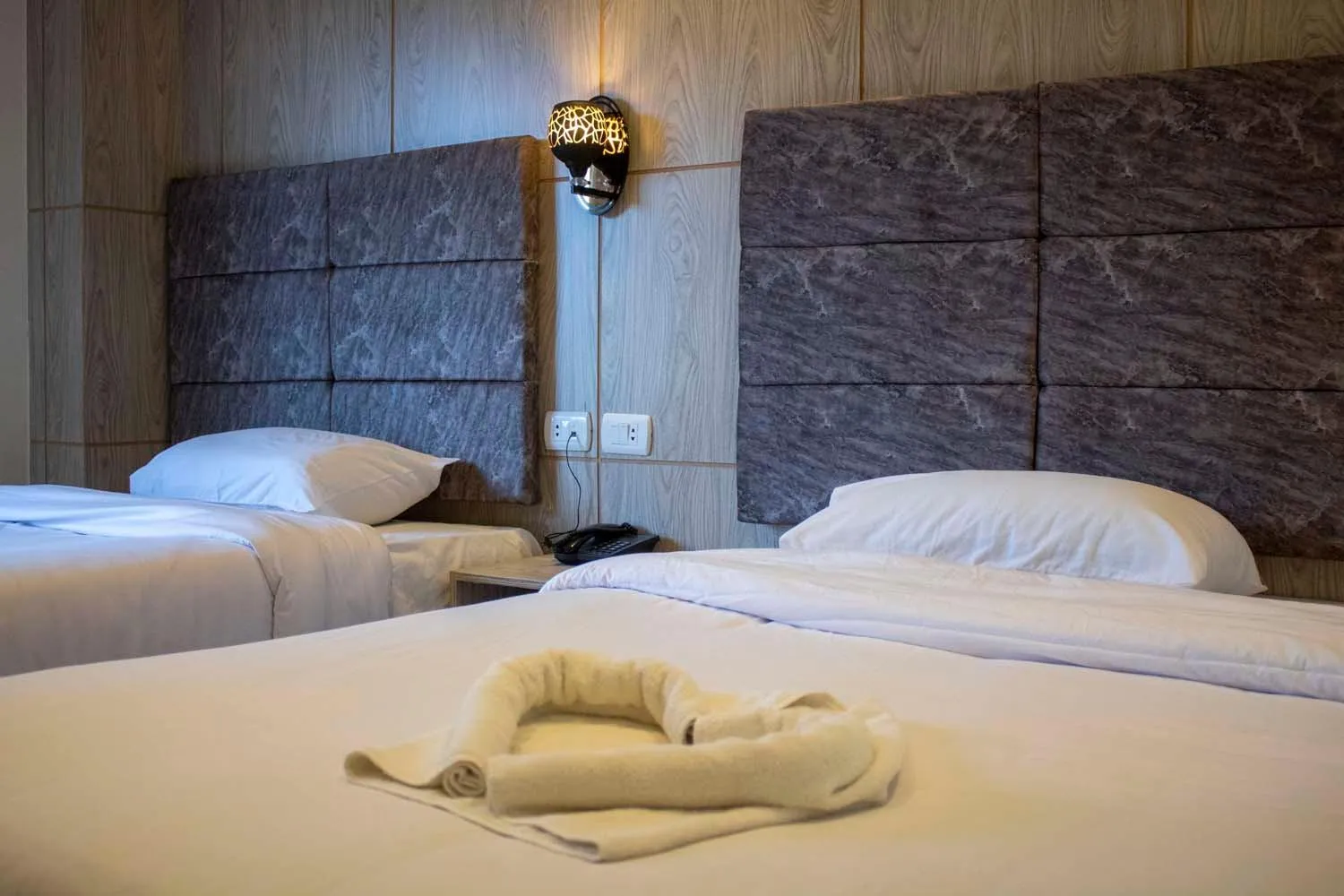 Bed in Nine Pyramids View Hotel