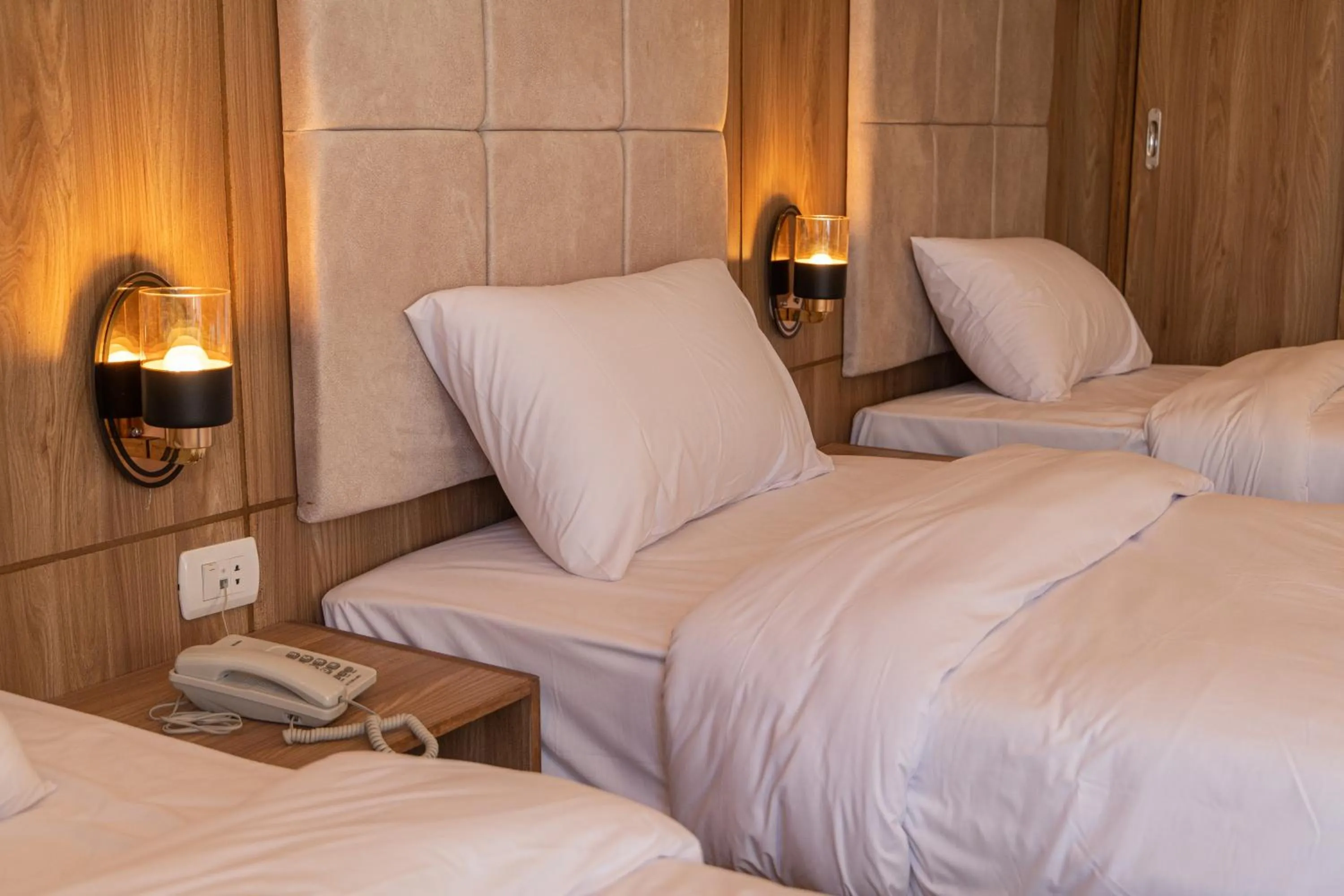 Bed in Nine Pyramids View Hotel