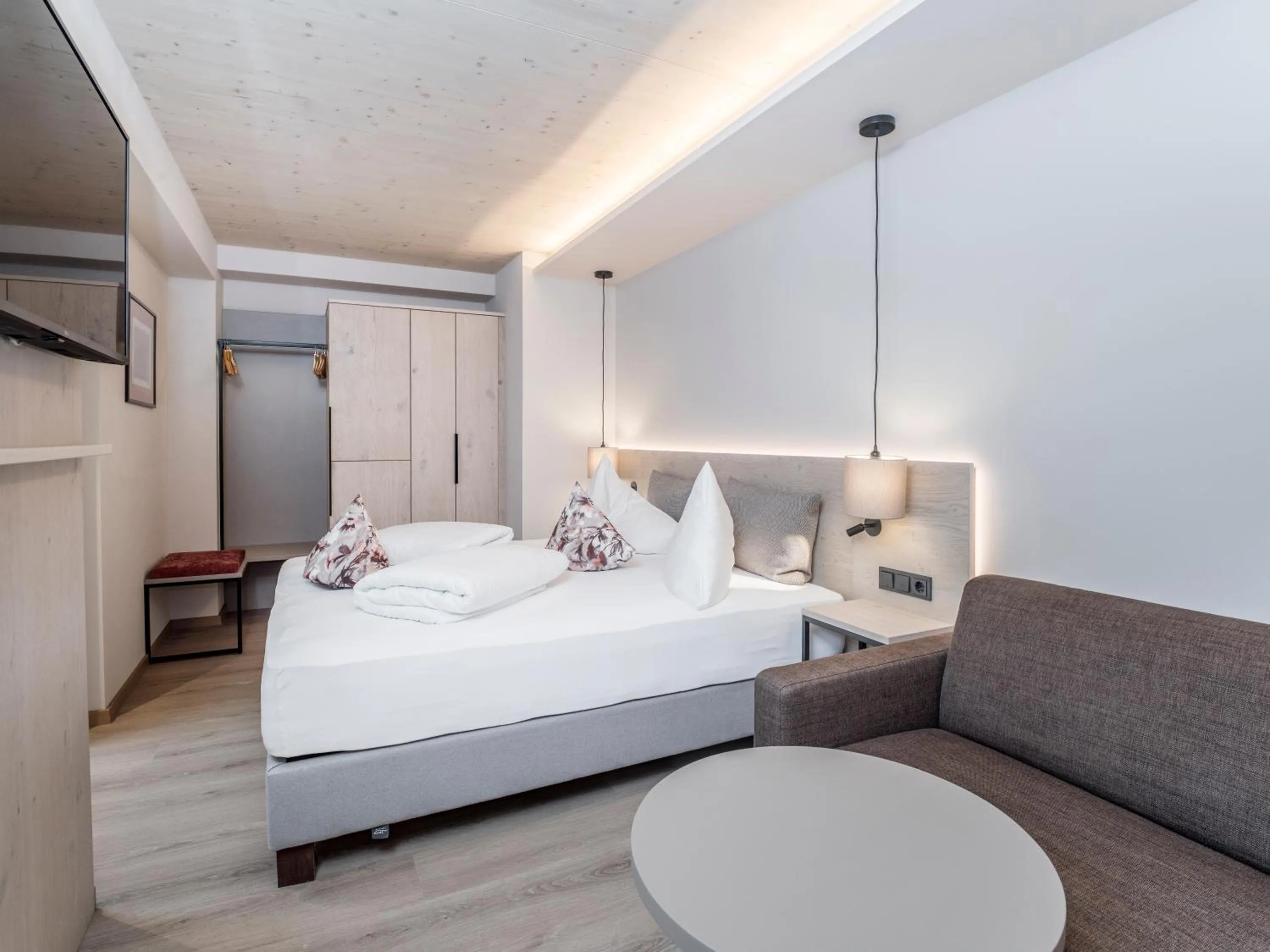 Photo of the whole room, Bed in Aktivhotel Schweizerhof Kitzbühel