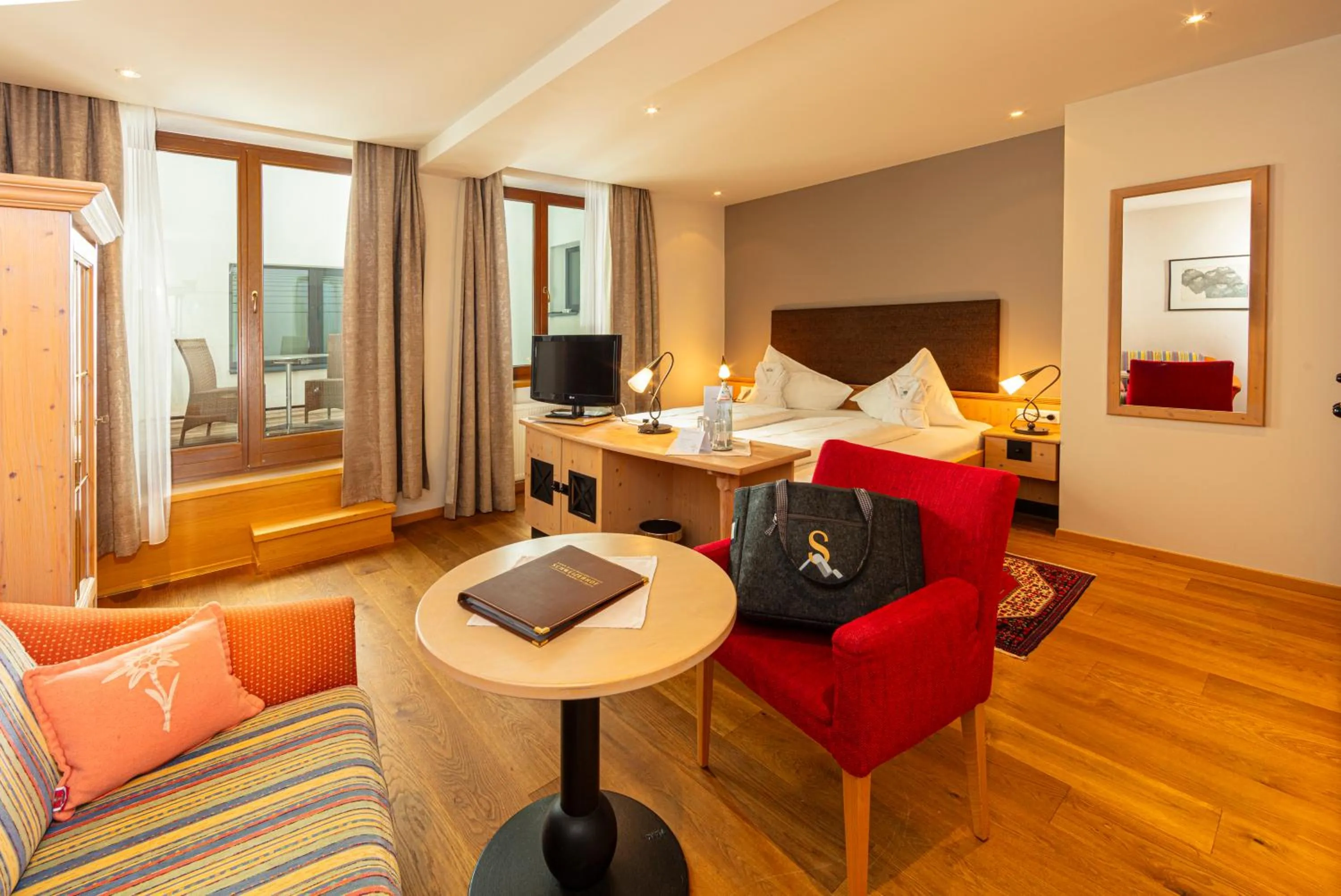 Photo of the whole room, Bed in Aktivhotel Schweizerhof Kitzbühel