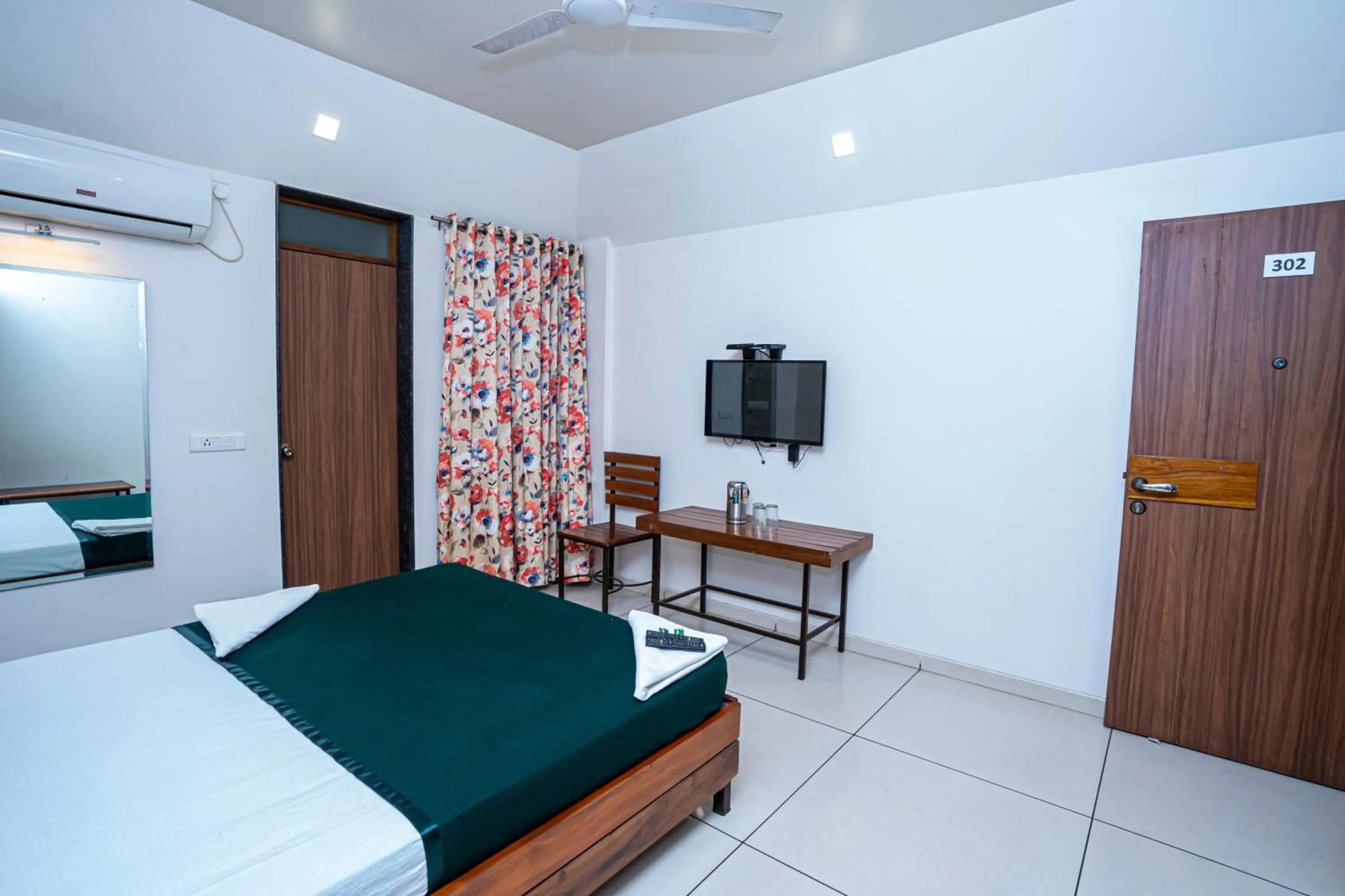 Bedroom in Hotel Prafulla Pure Veg