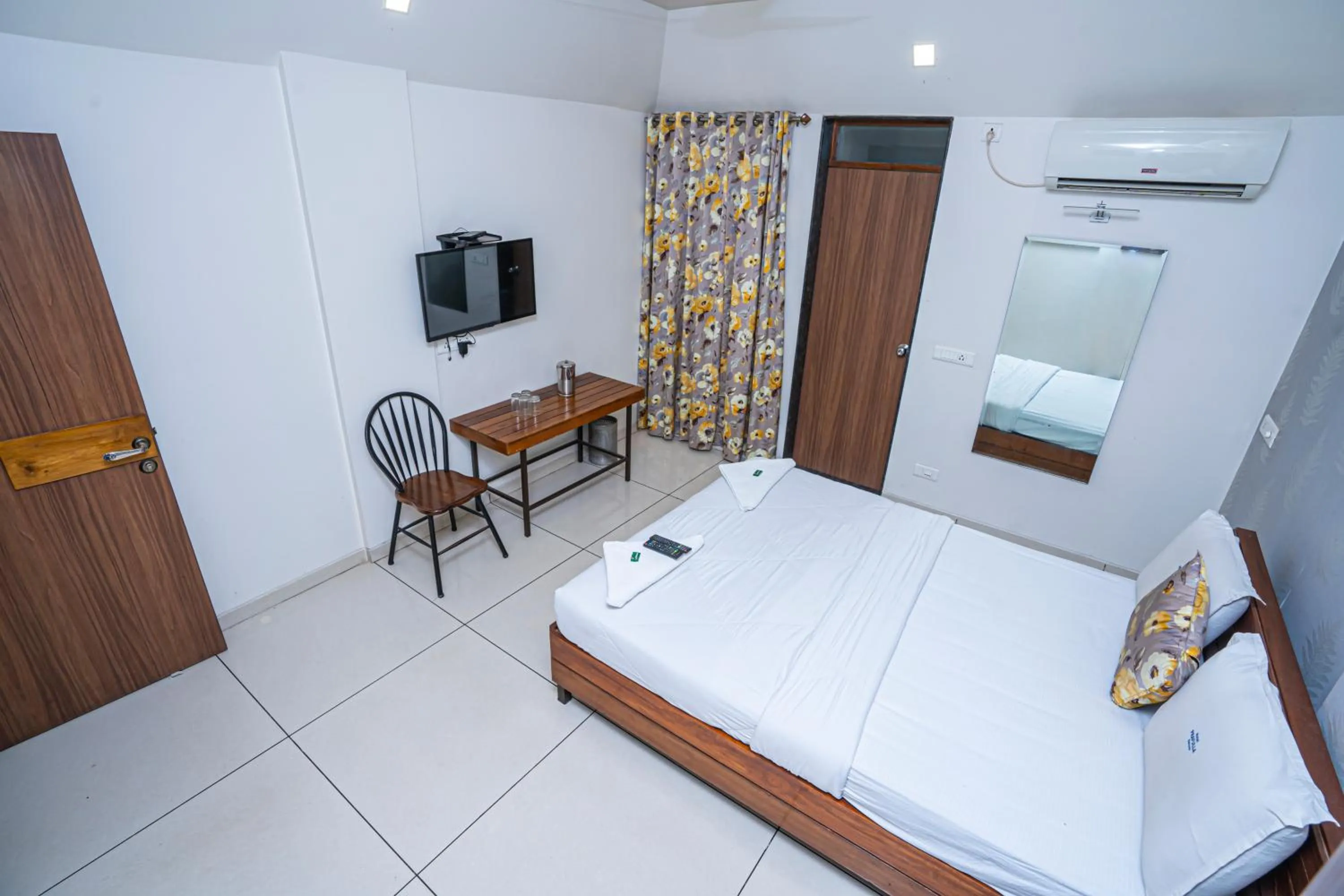 Bedroom in Hotel Prafulla Pure Veg