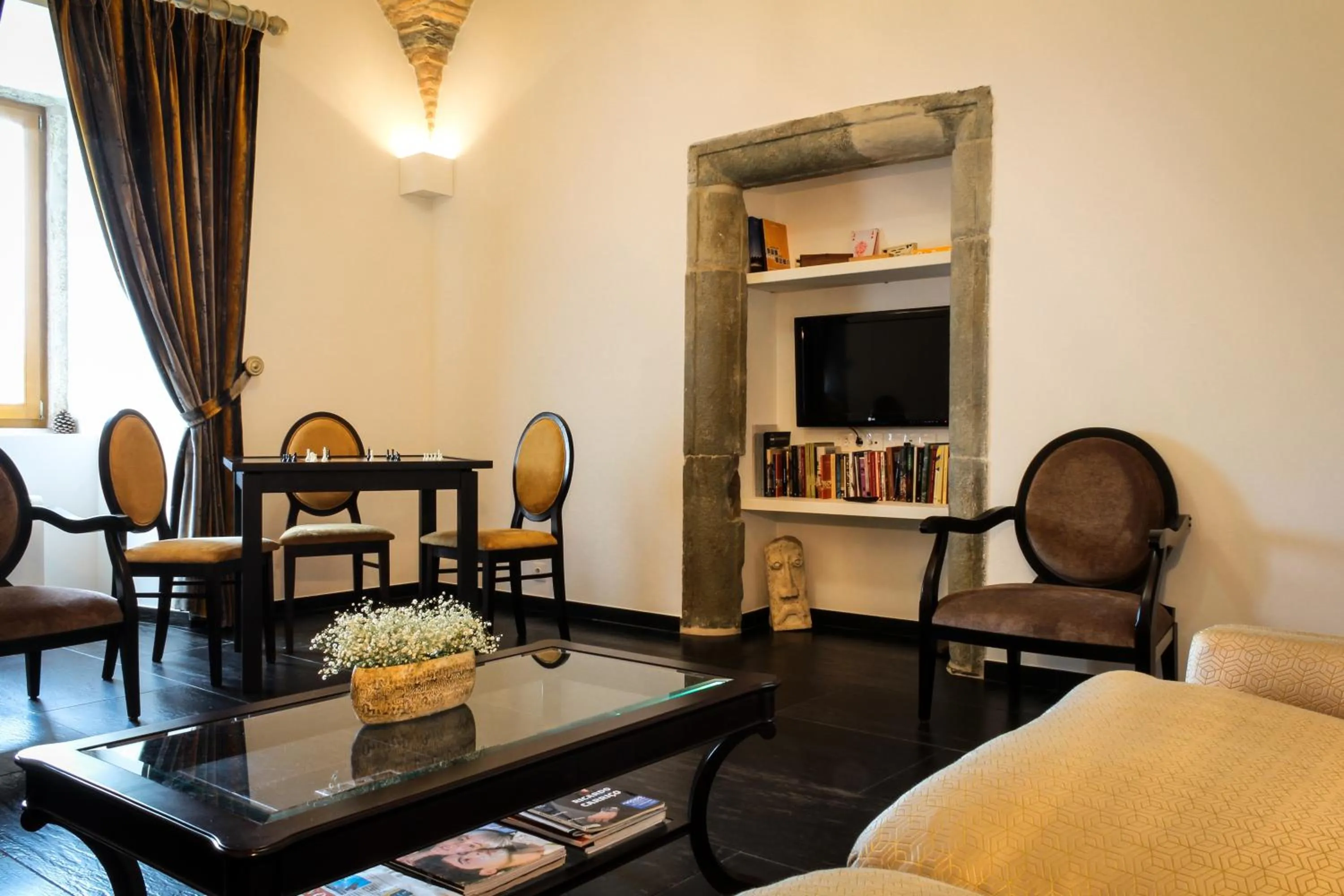 Communal lounge/ TV room in Convento Da Serta Hotel