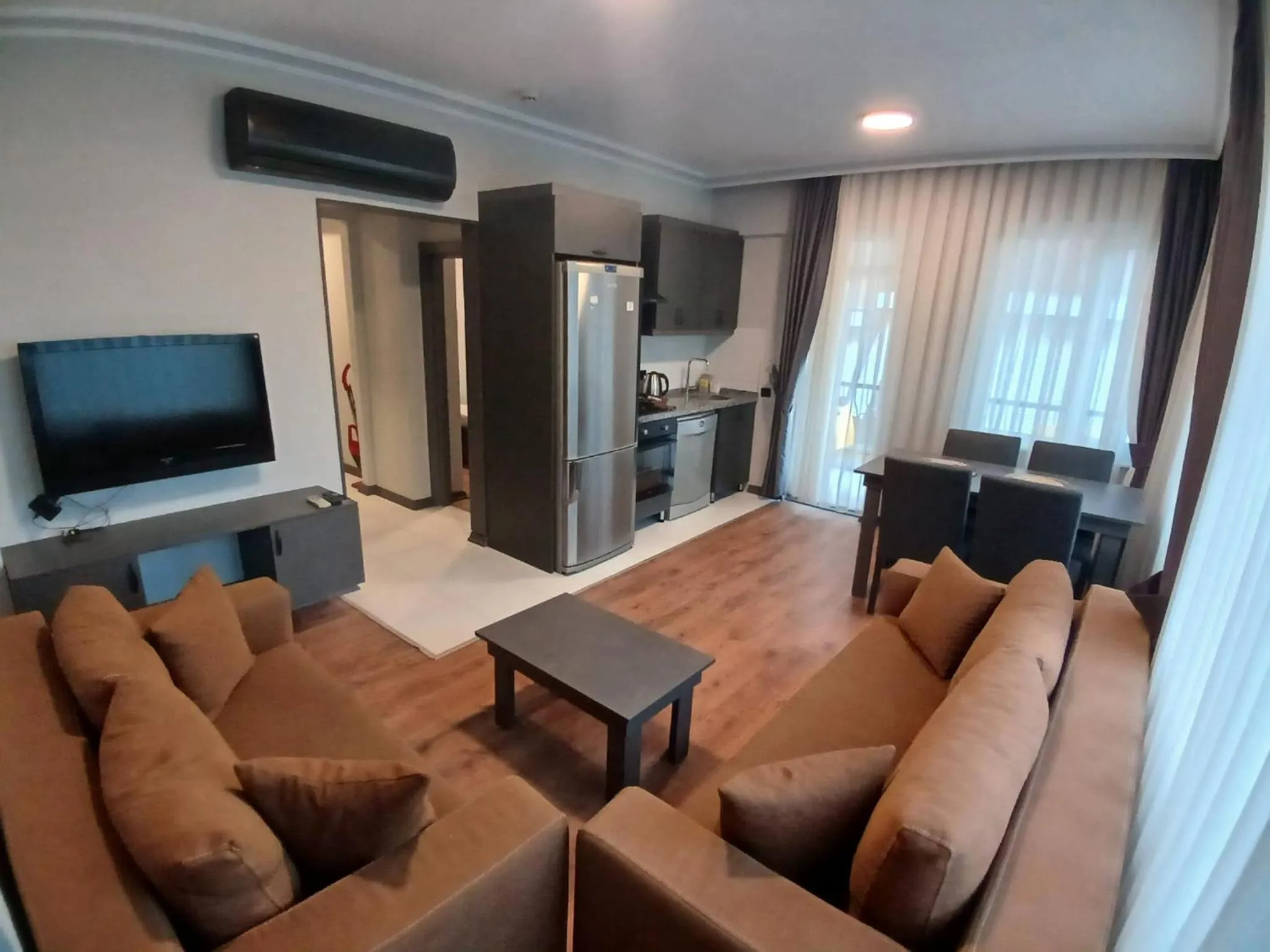 Communal lounge/ TV room in The U HOMES APART