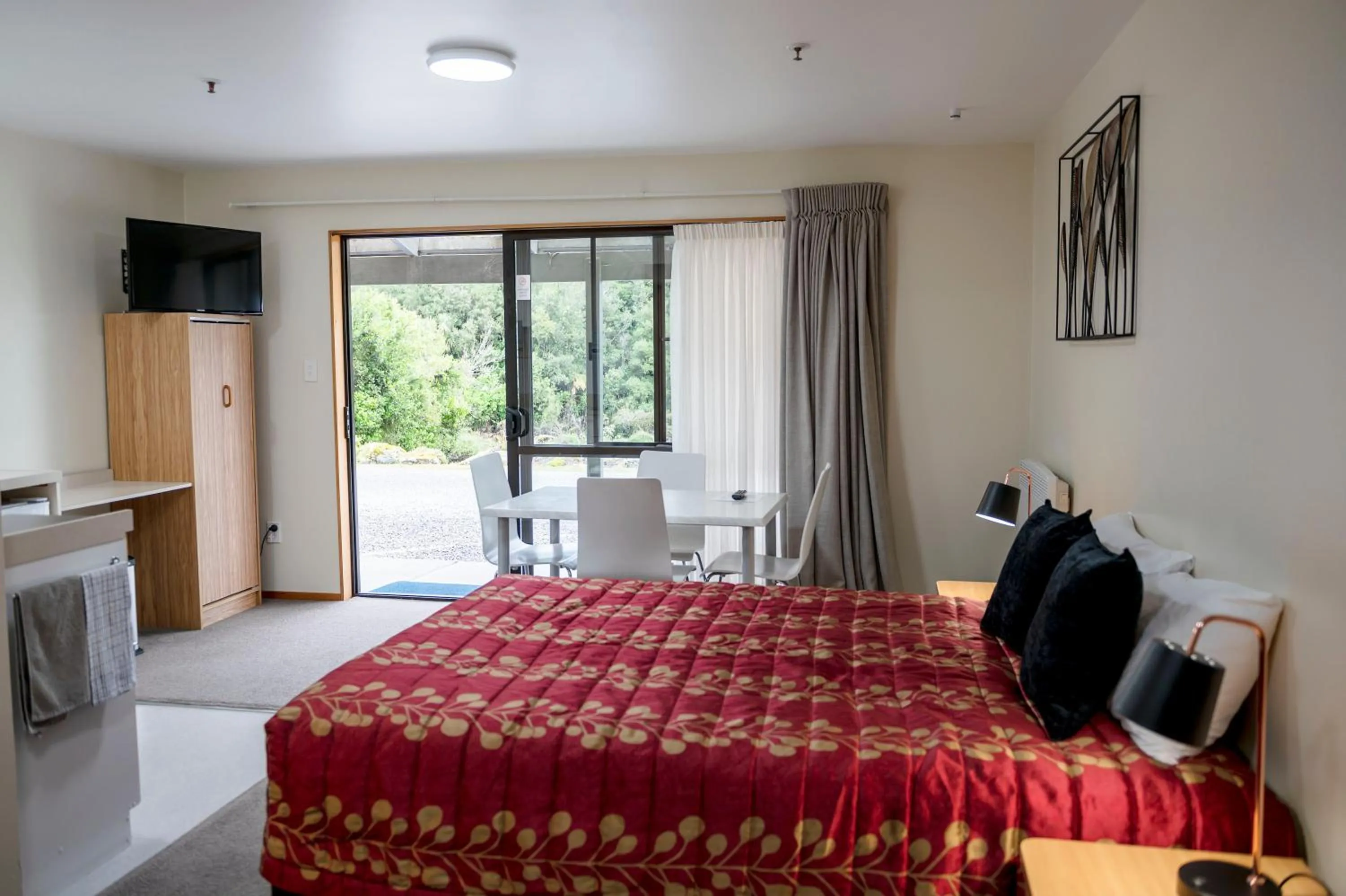 Bed in ASURE Aspiring Court Motel