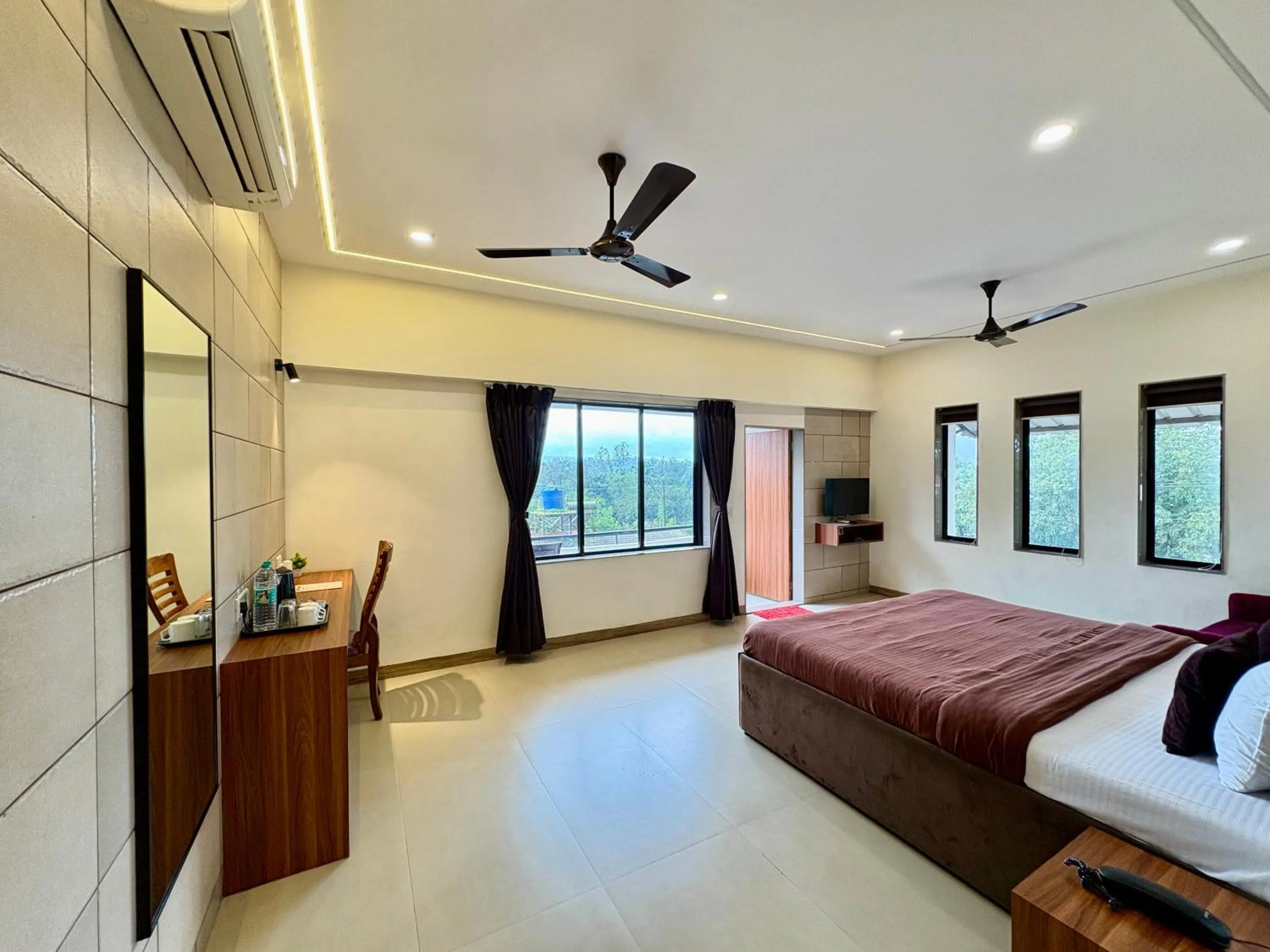 View (from property/room), Bed in Girivihar Holiday Club - Pure Veg
