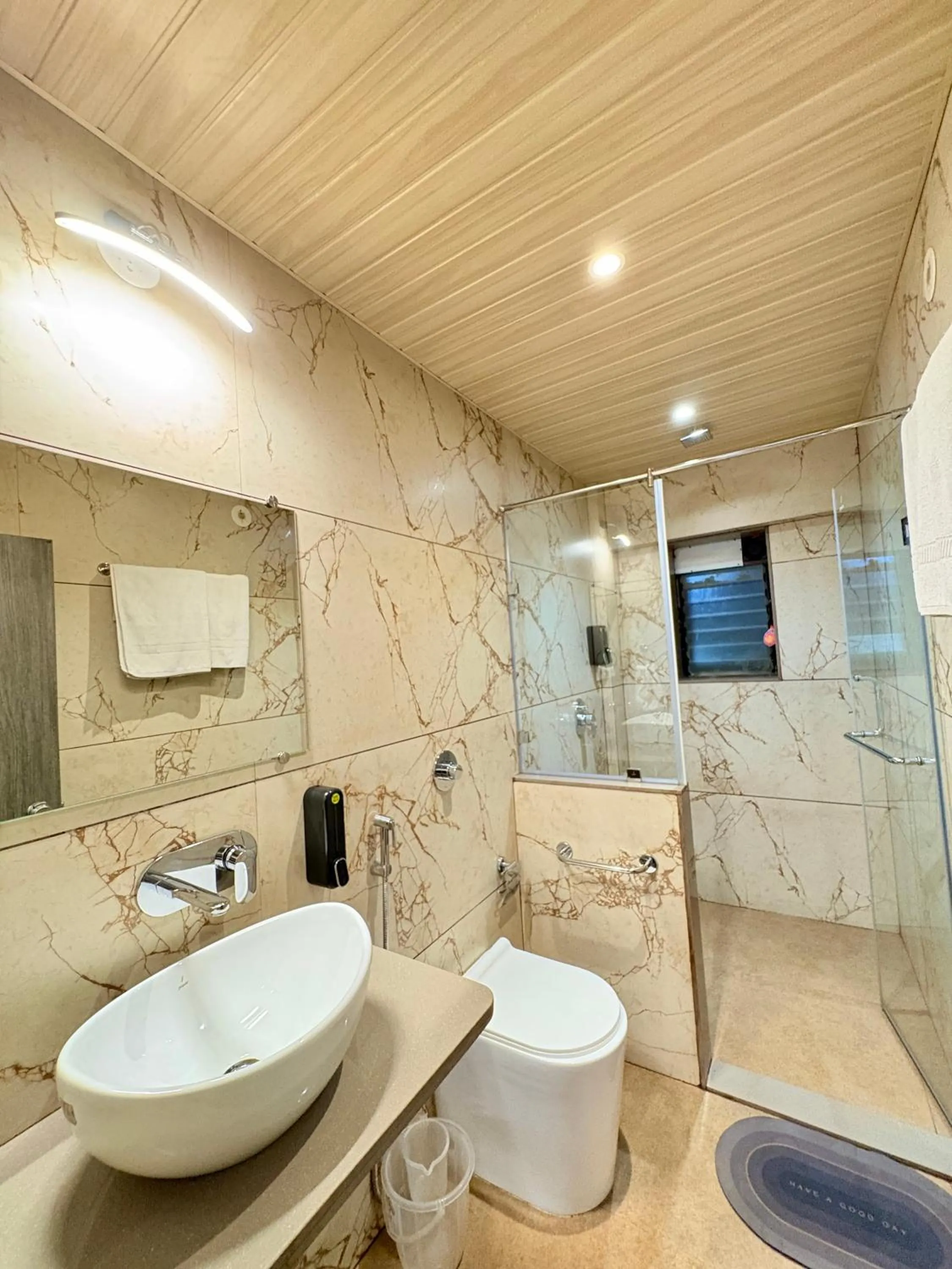 Shower in Girivihar Holiday Club - Pure Veg