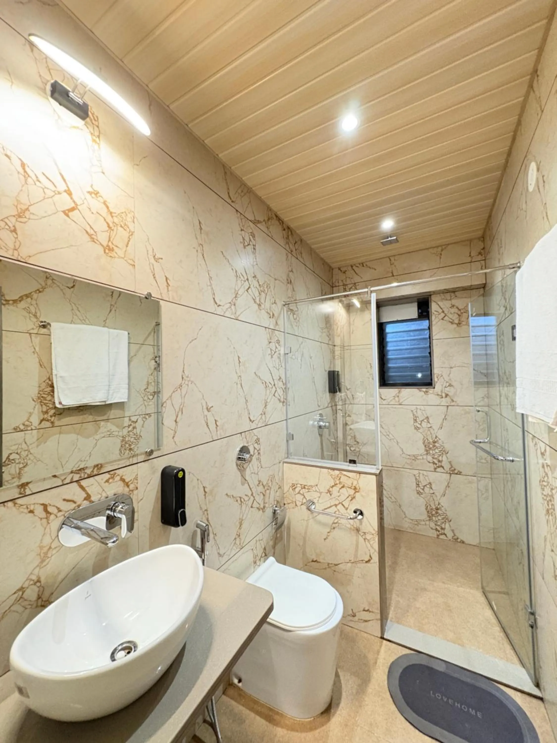 Shower in Girivihar Holiday Club - Pure Veg