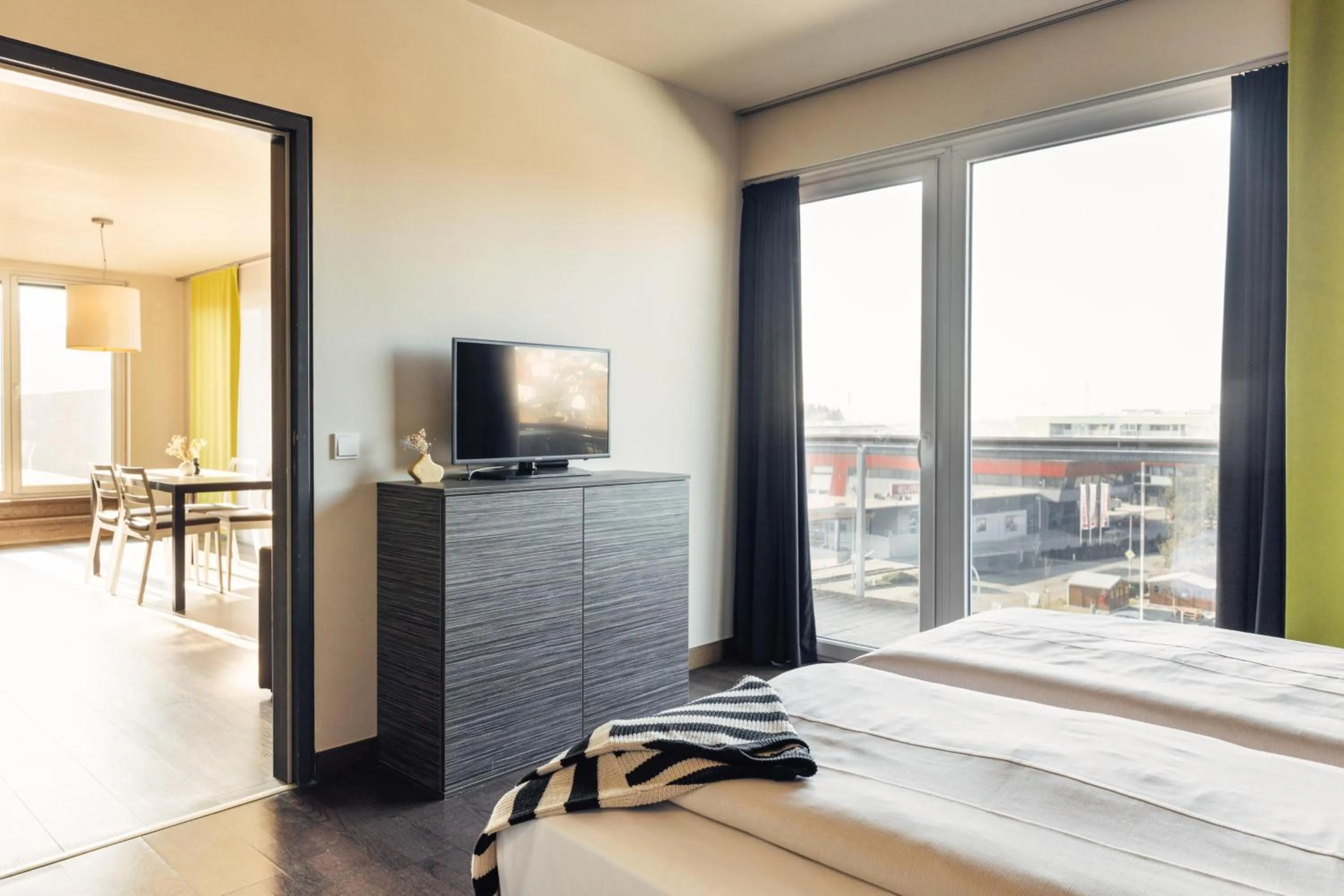 Photo of the whole room, Bed in harry's home Hart bei Graz hotel & apartments