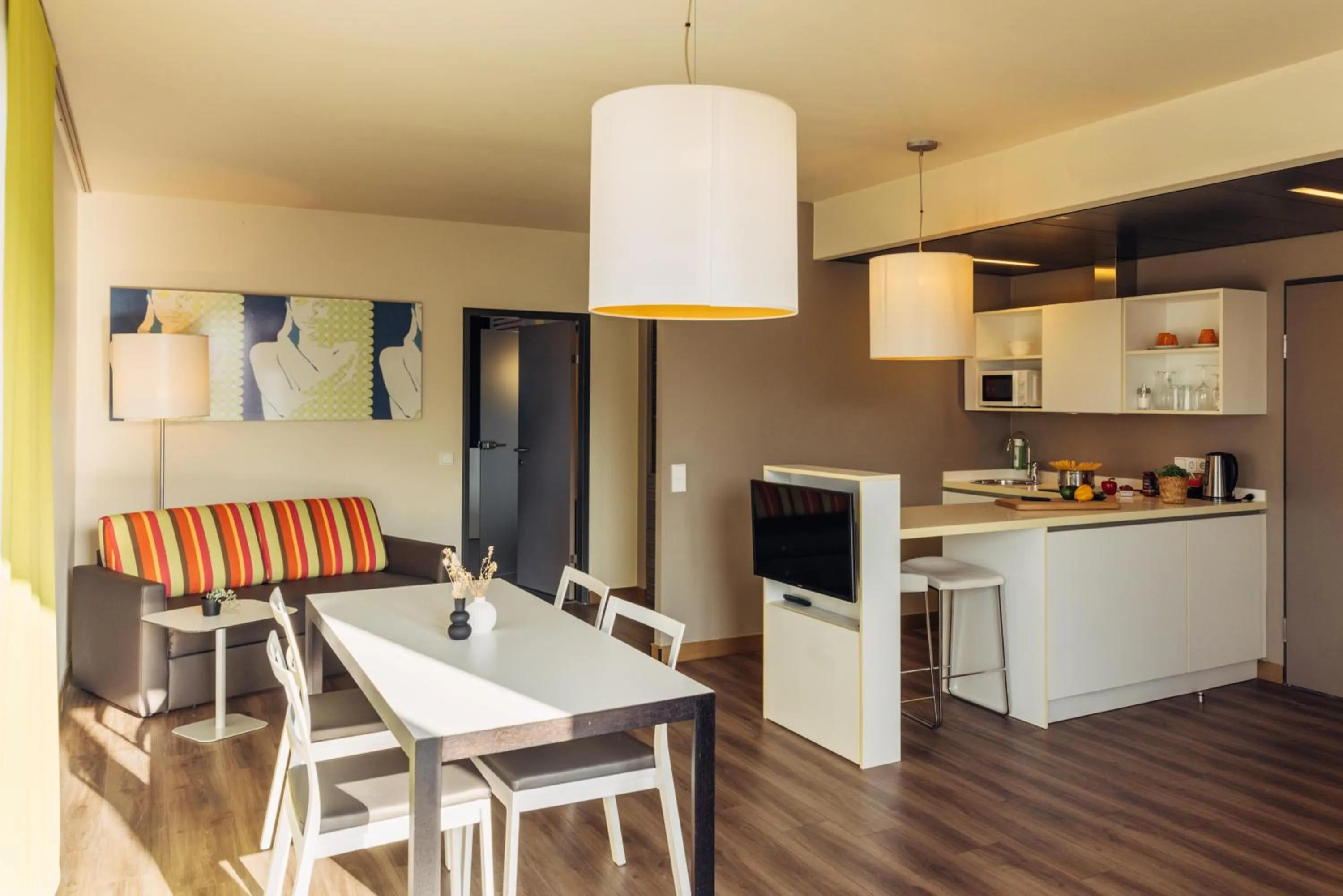 Photo of the whole room in harry's home Hart bei Graz hotel & apartments