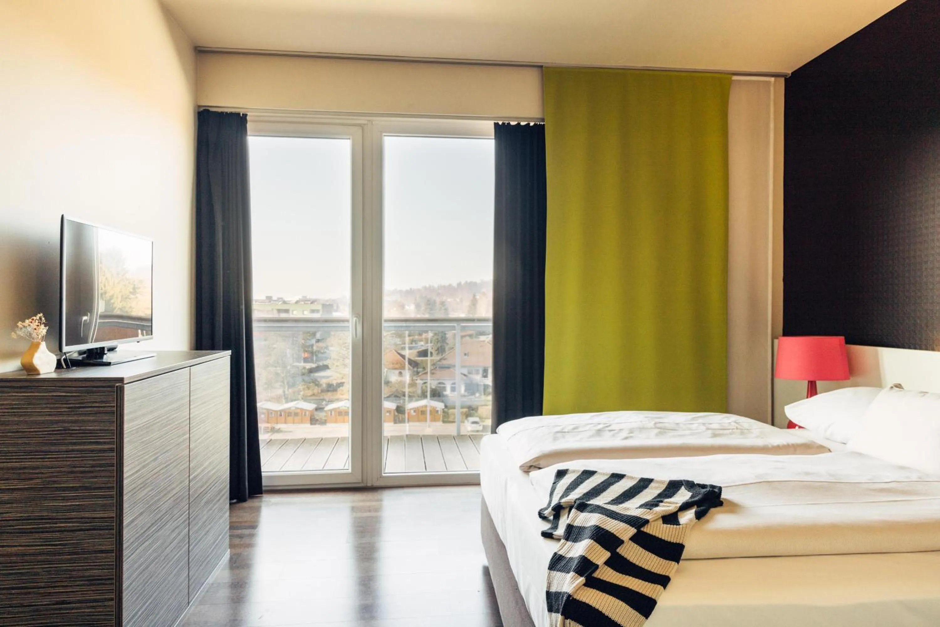 Photo of the whole room, Bed in harry's home Hart bei Graz hotel & apartments
