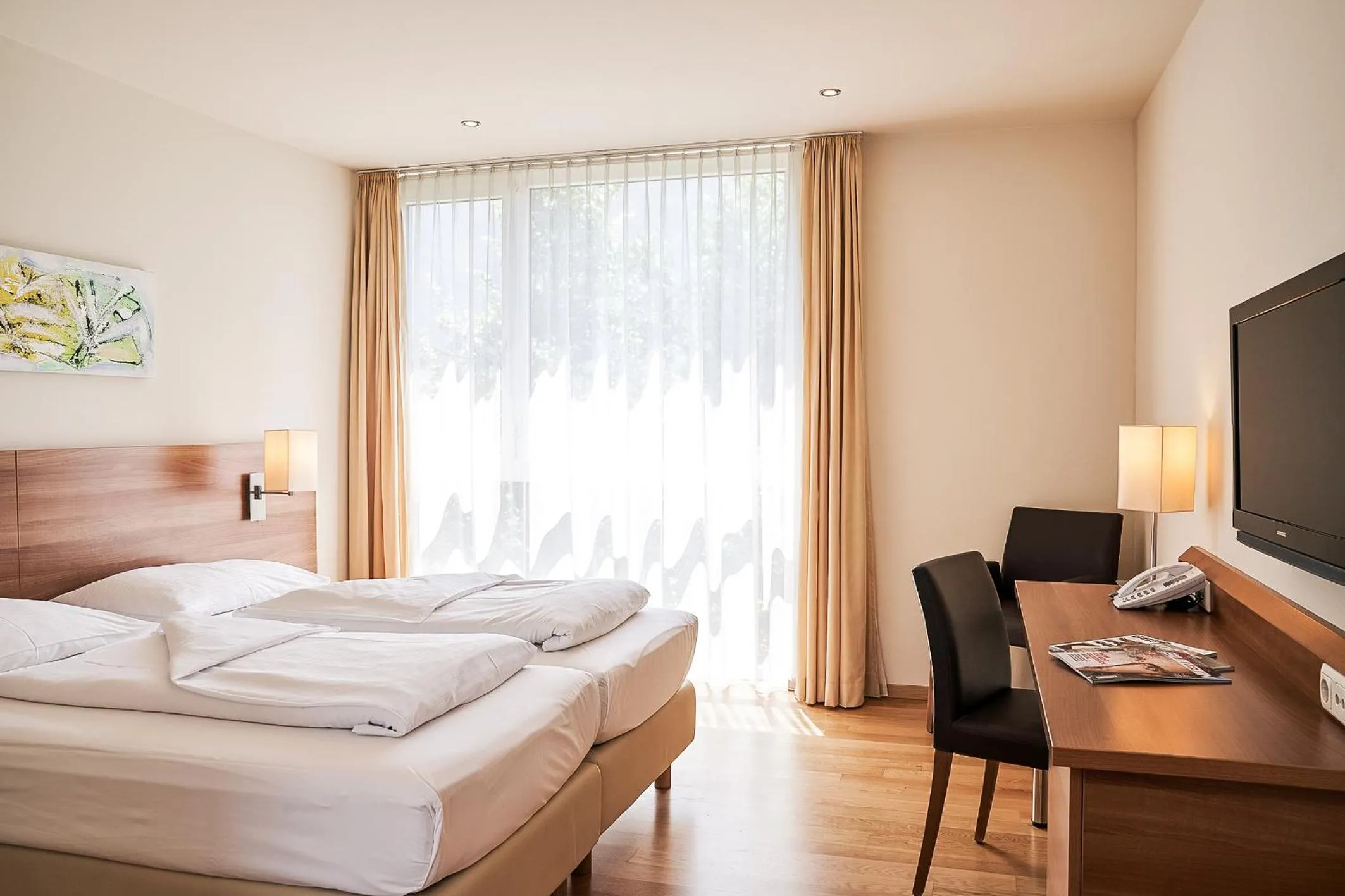 Photo of the whole room, Bed in Fairmotel Dornbirn