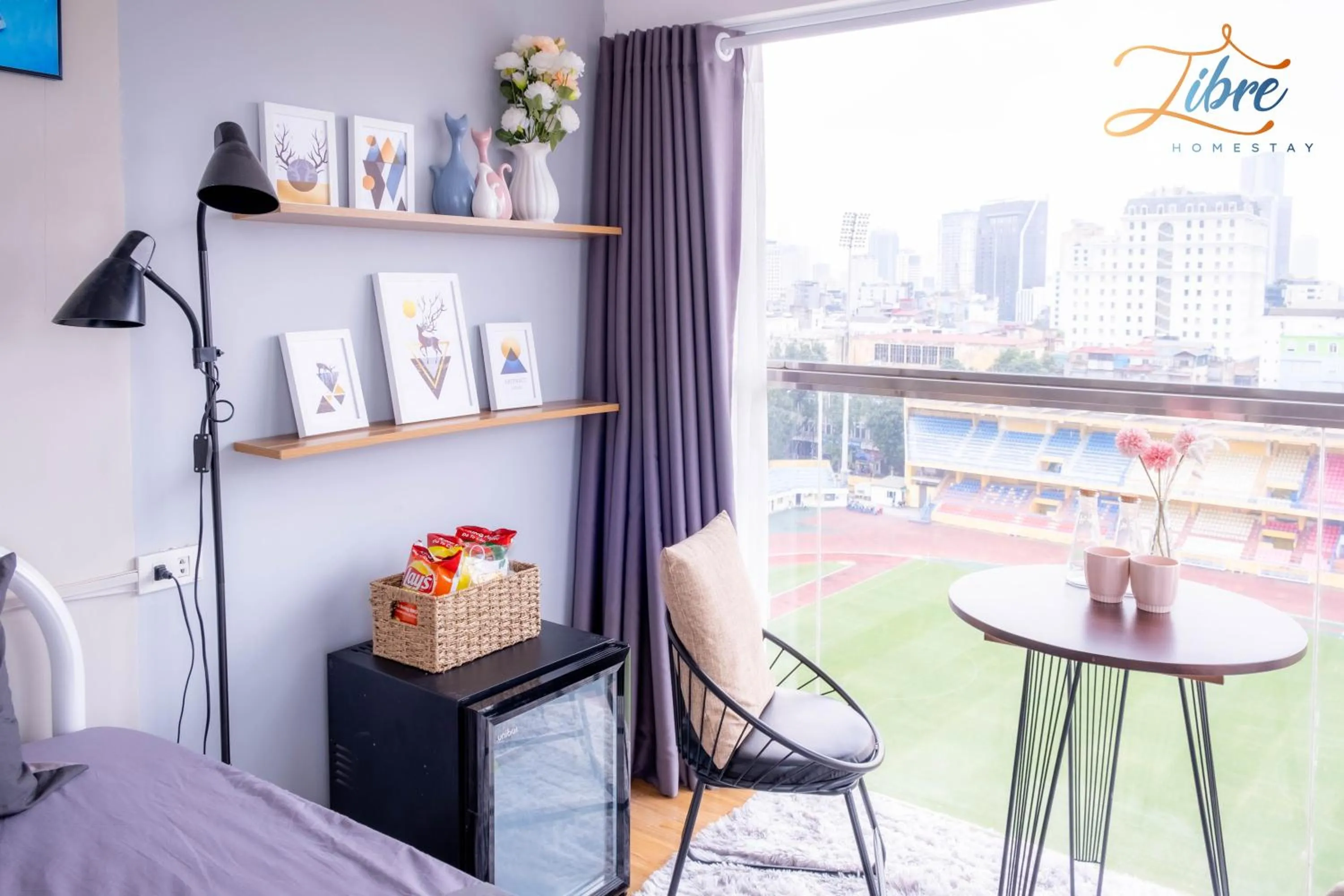 Seating area, Bed in Libré Homestay