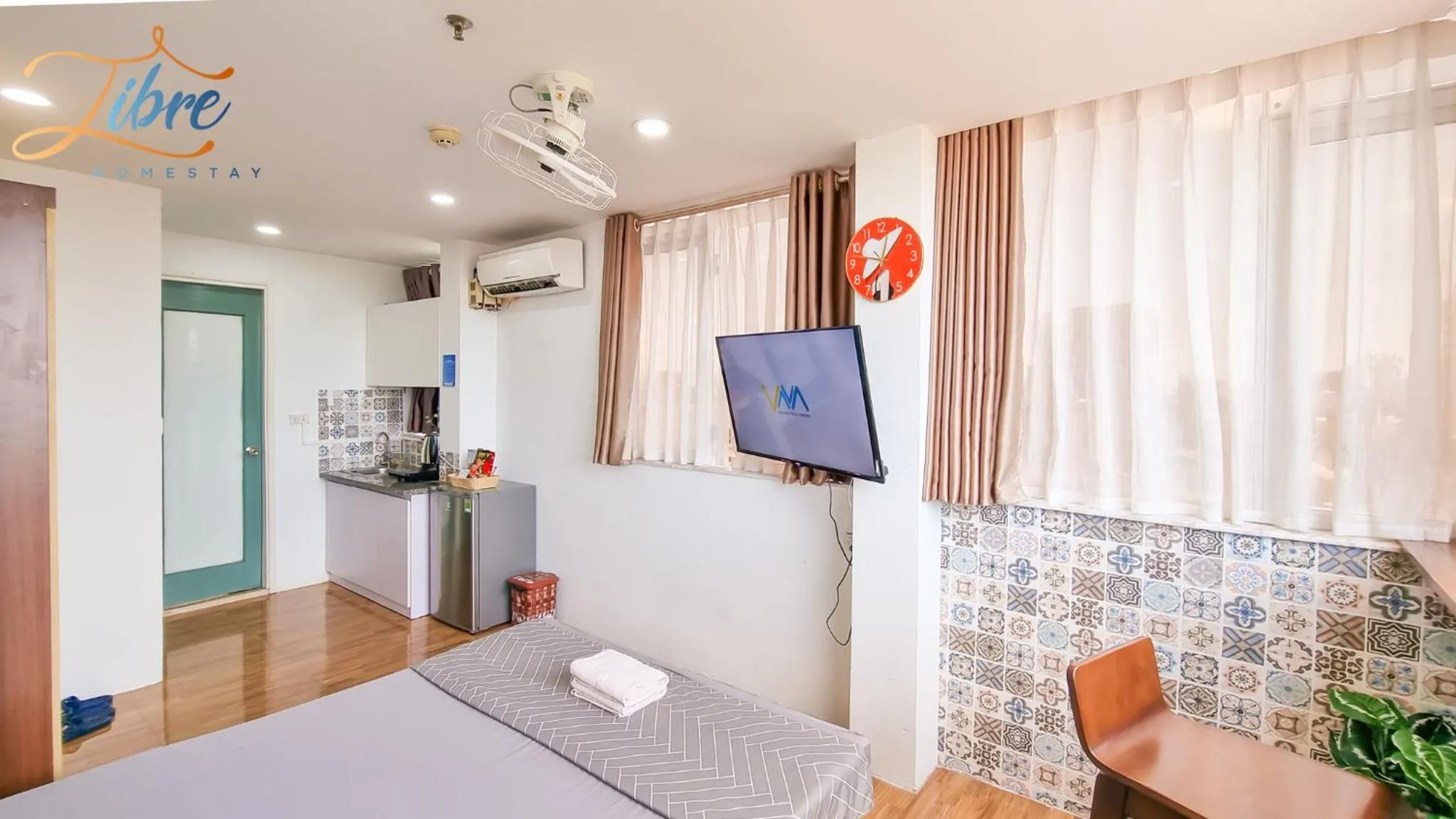 Communal lounge/ TV room in Libré Homestay