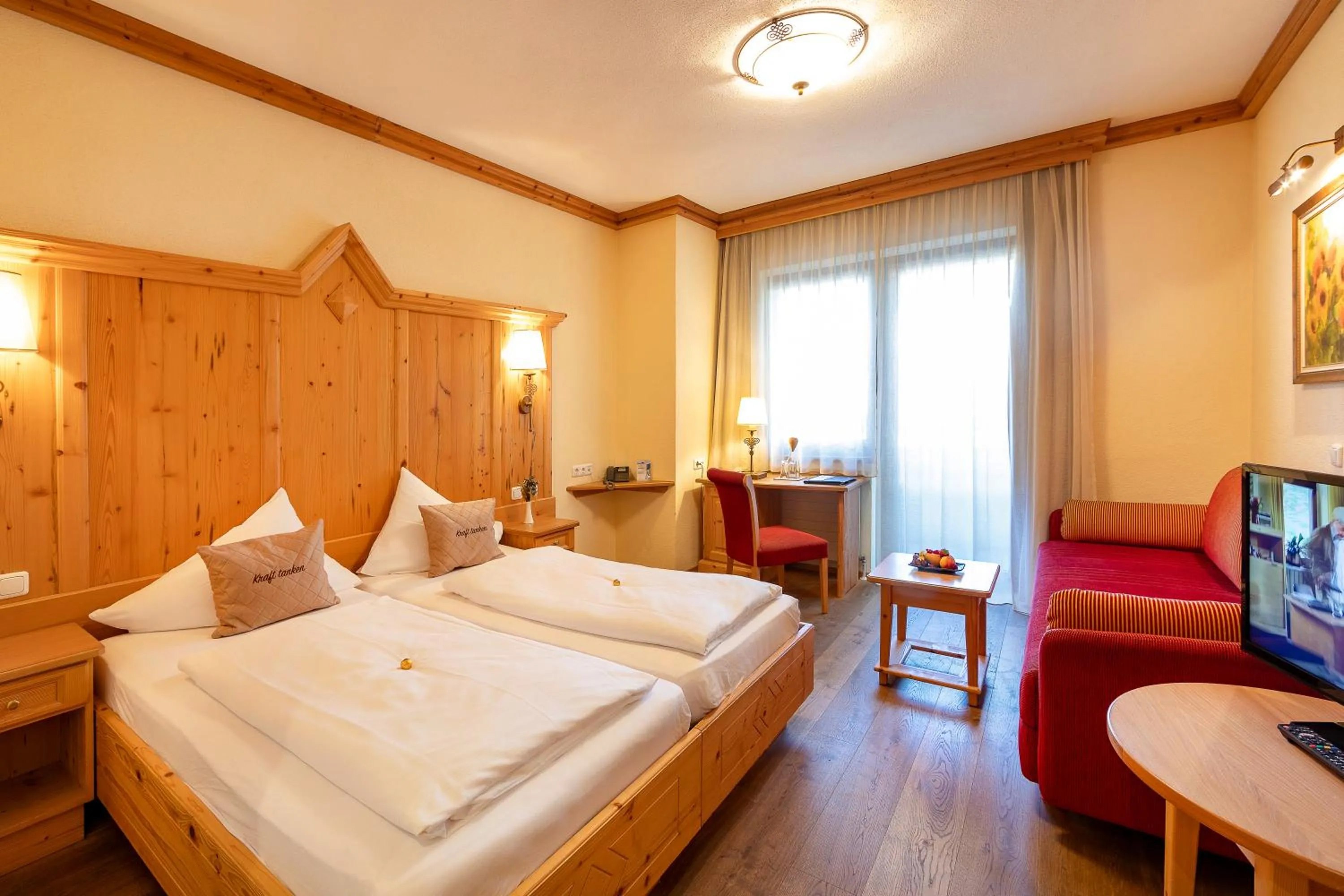 Photo of the whole room, Bed in Aktivhotel Alpendorf