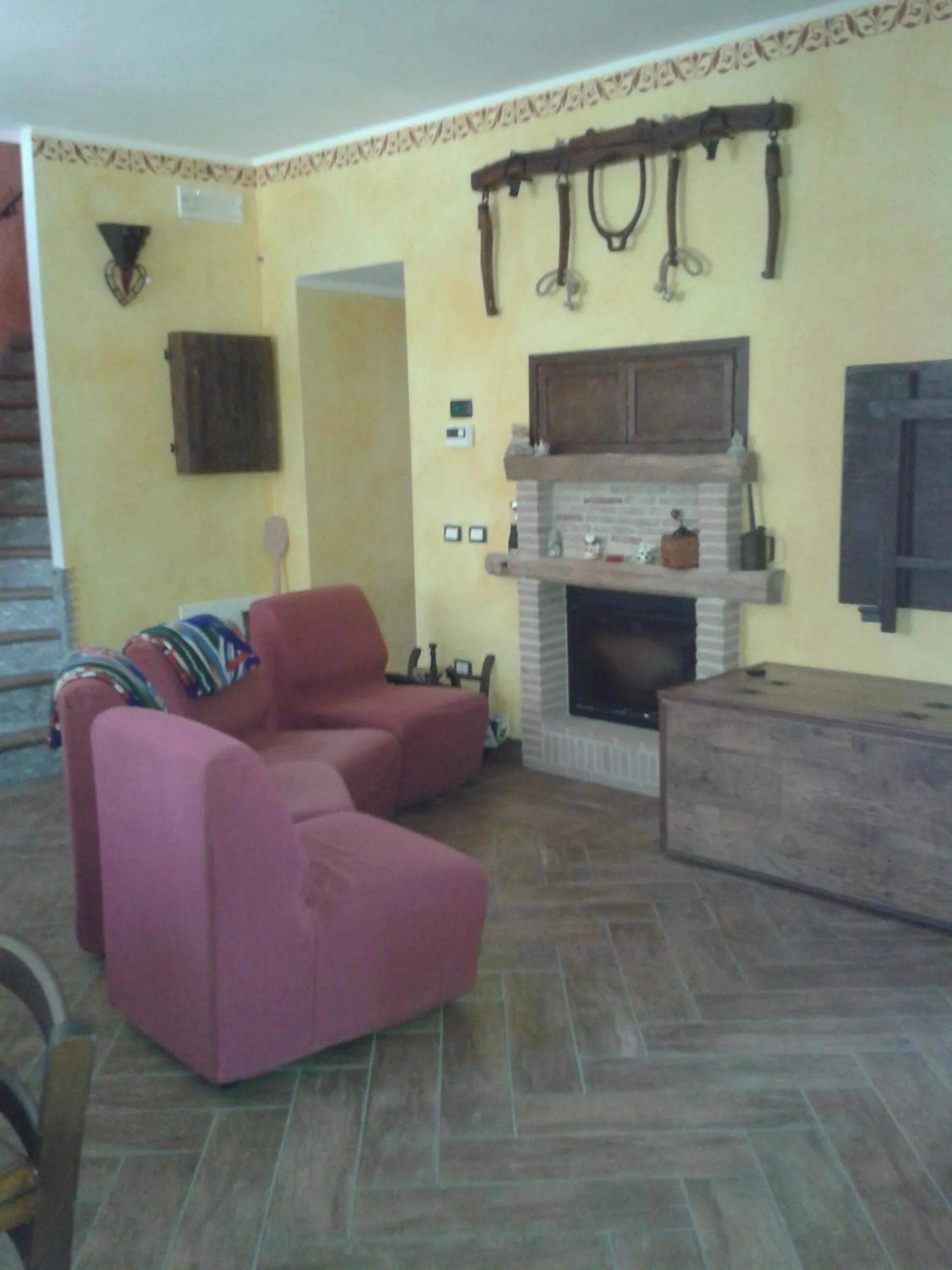 Communal lounge/ TV room in B&B Le Due Rocche