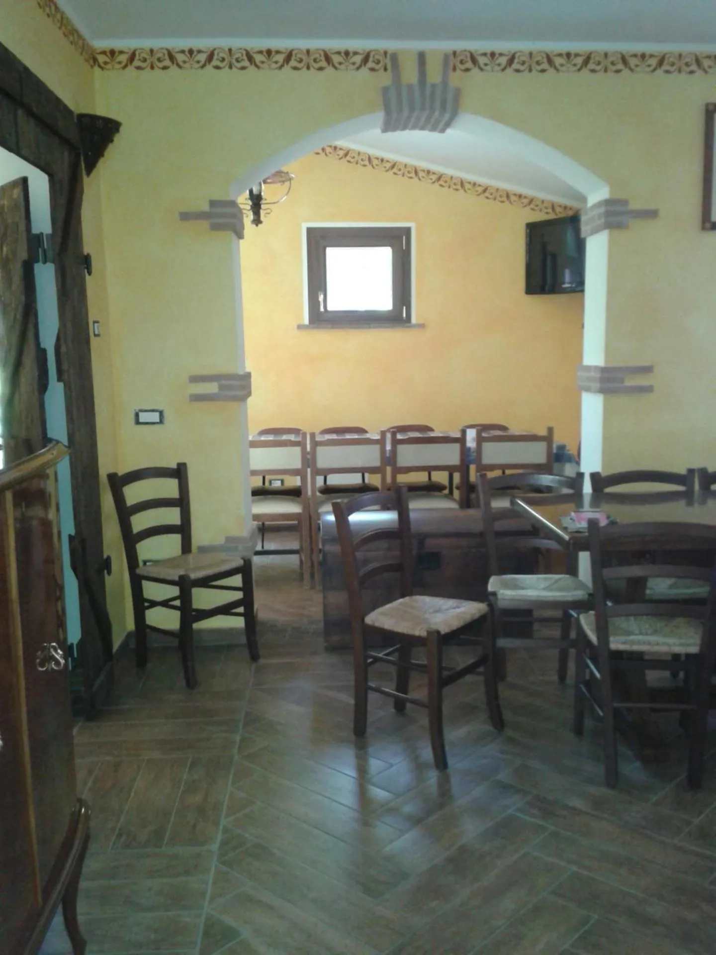 Communal lounge/ TV room in B&B Le Due Rocche