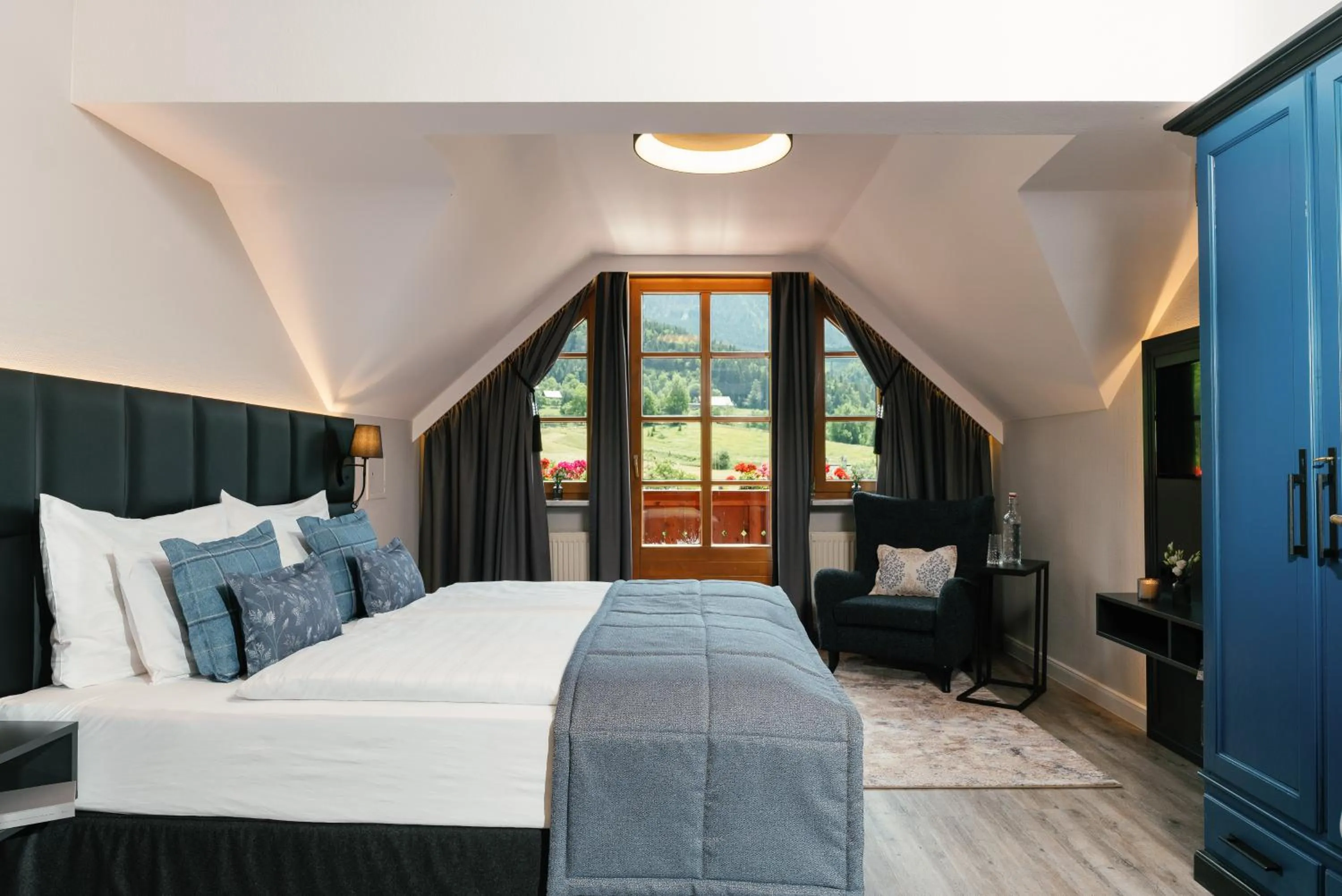 Photo of the whole room, Bed in MONDI Hotel am Grundlsee