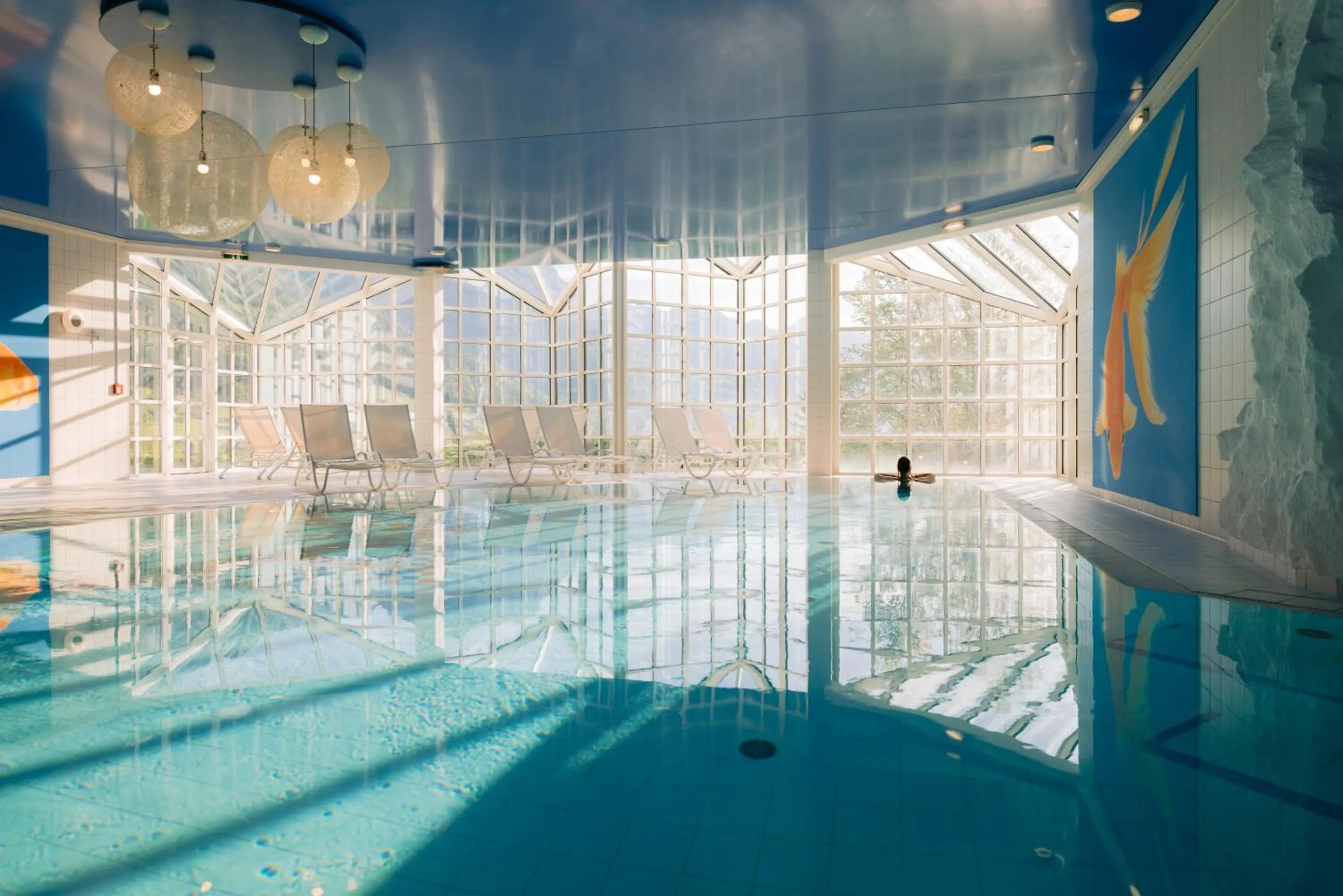 Swimming pool in MONDI Hotel am Grundlsee