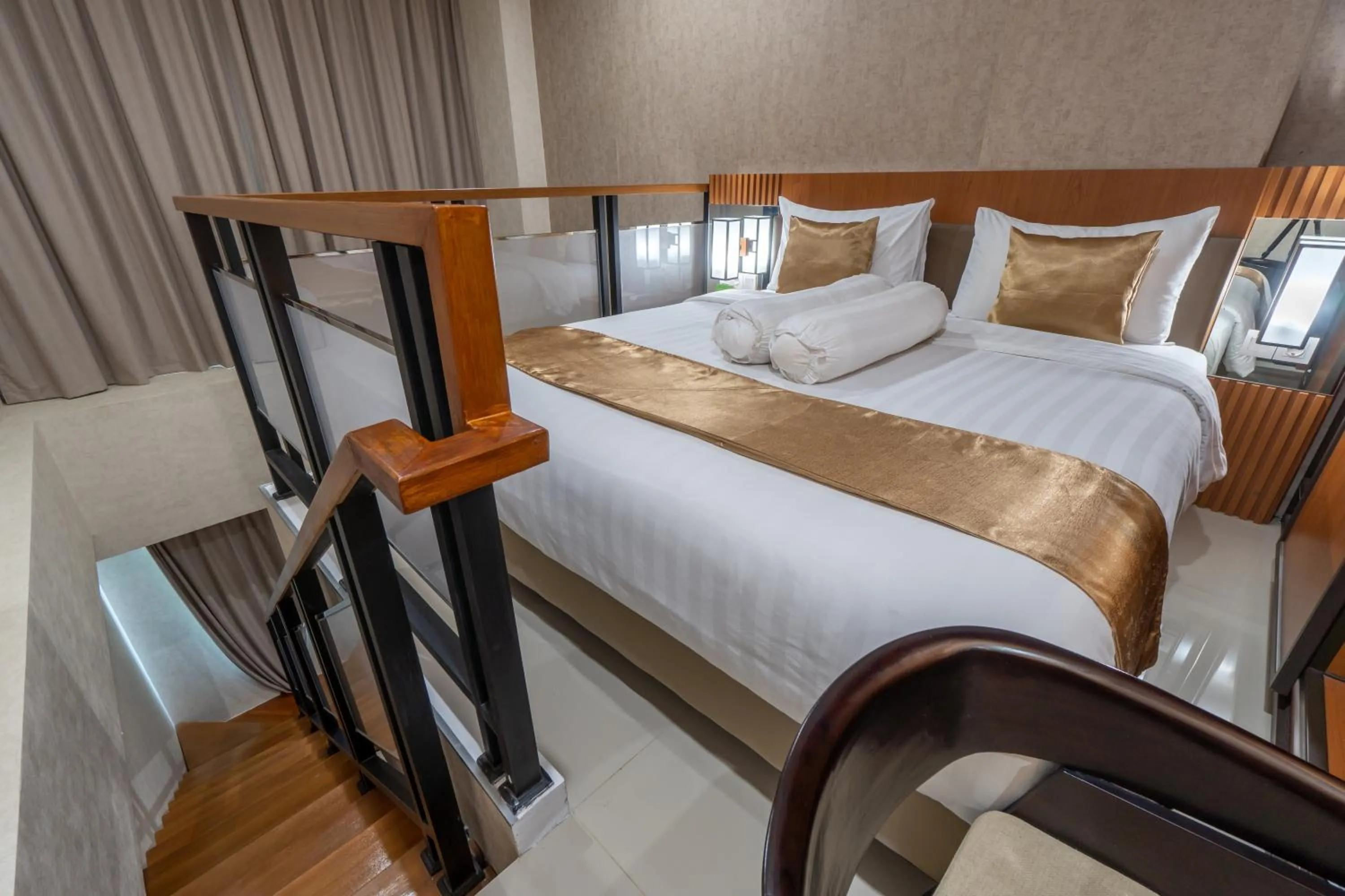 Bed in Braling Grand Hotel Purbalingga, Azana Hotels Collection