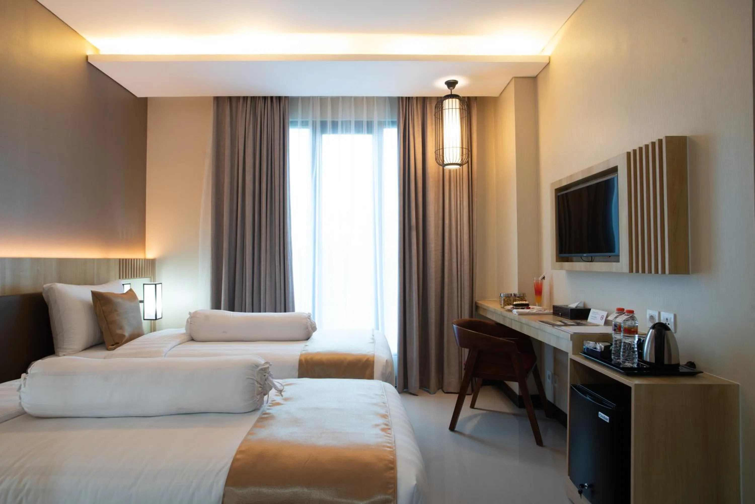 Bed in Braling Grand Hotel Purbalingga, Azana Hotels Collection