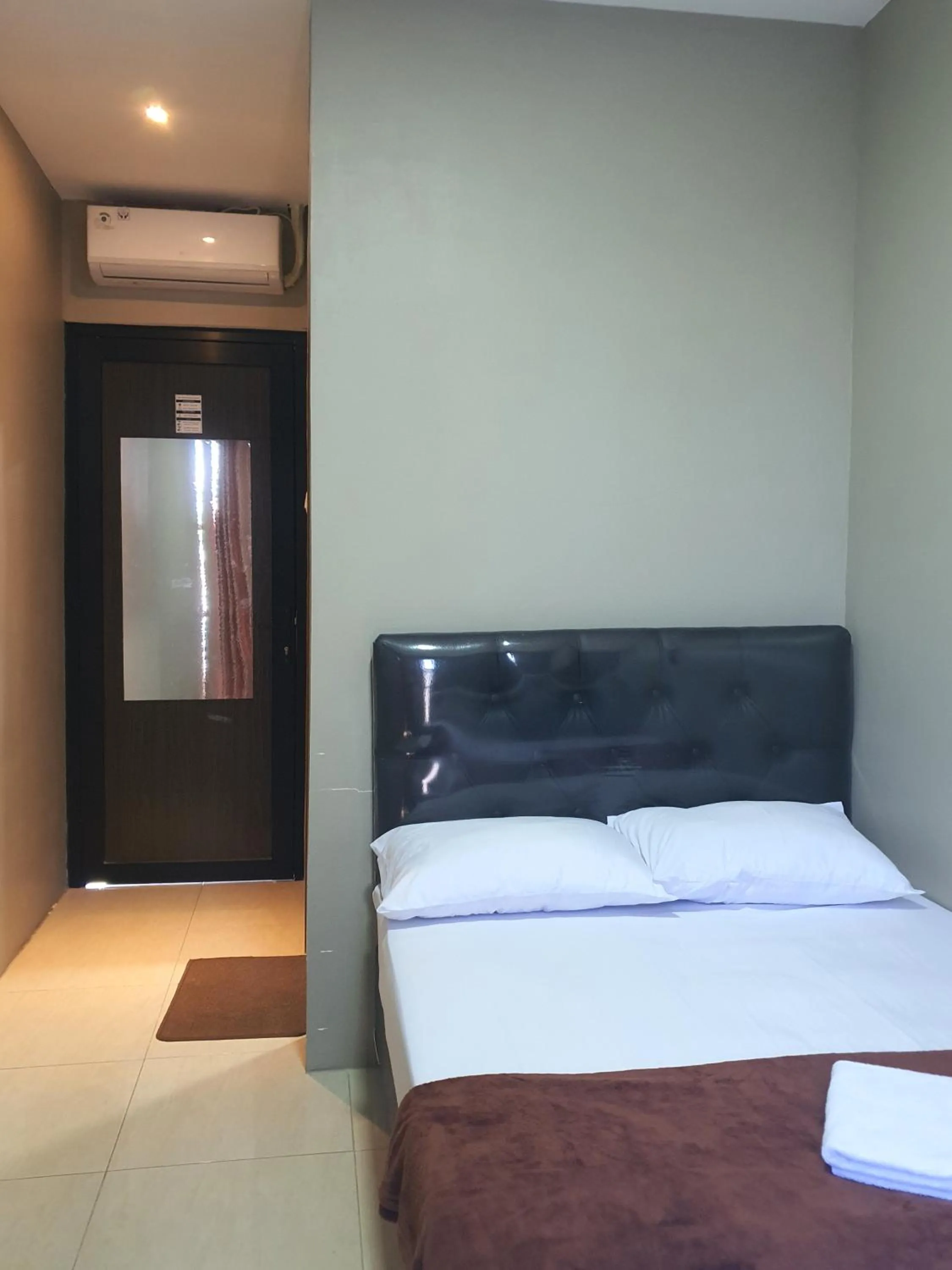 Bed in EDUTAMA Homestay Syariah