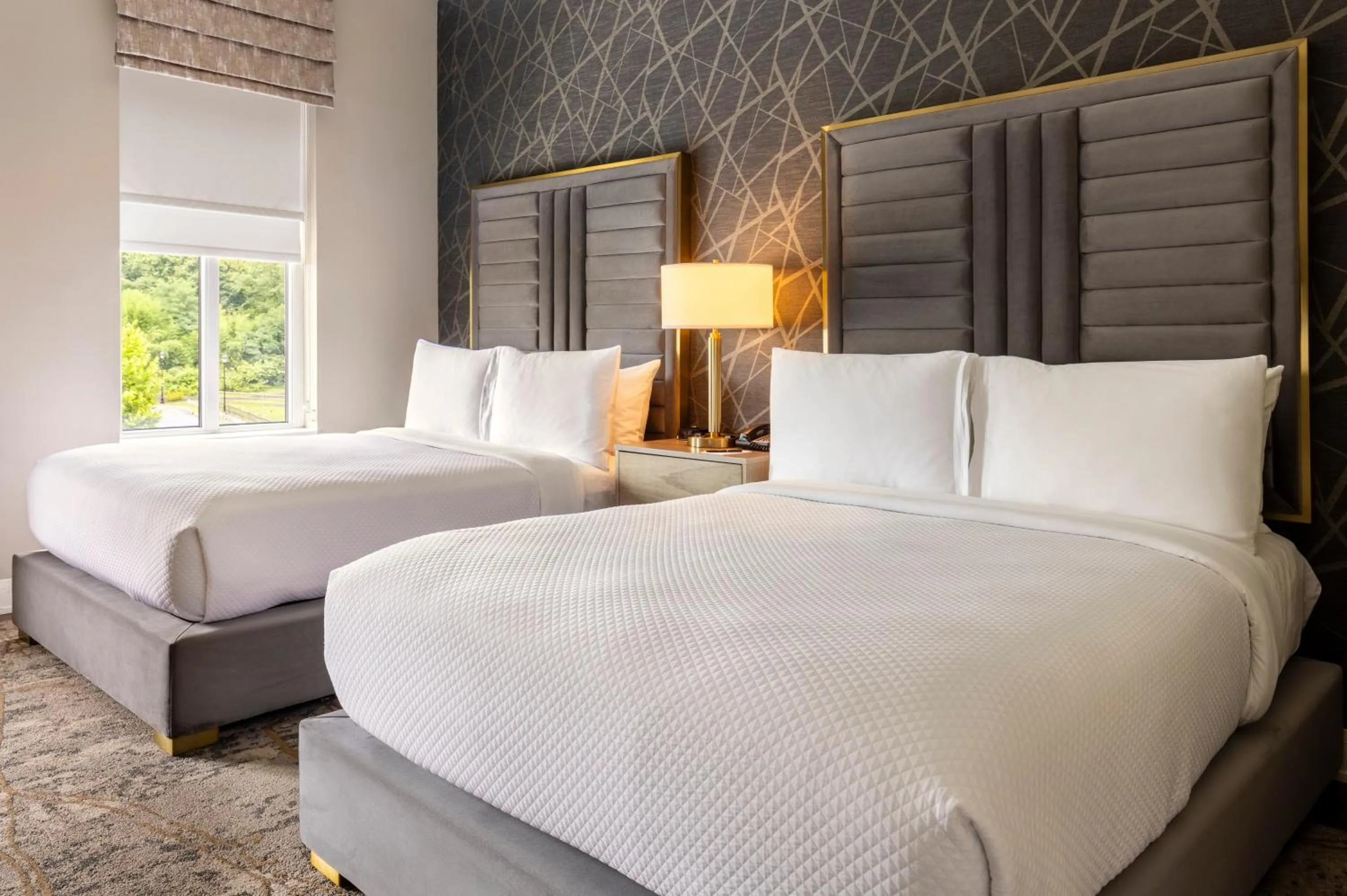 Bed in The Chateau Grande Hotel