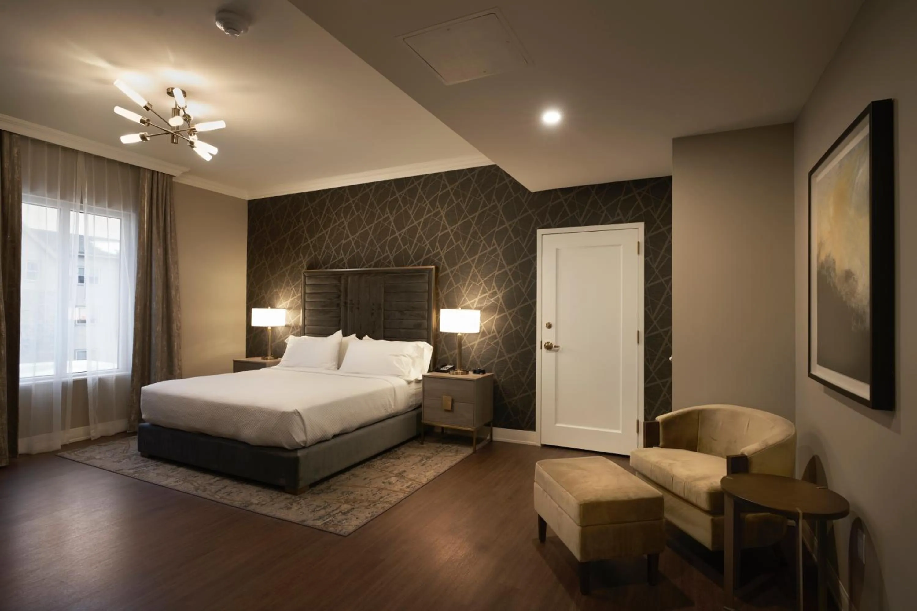 Photo of the whole room, Bed in The Chateau Grande Hotel