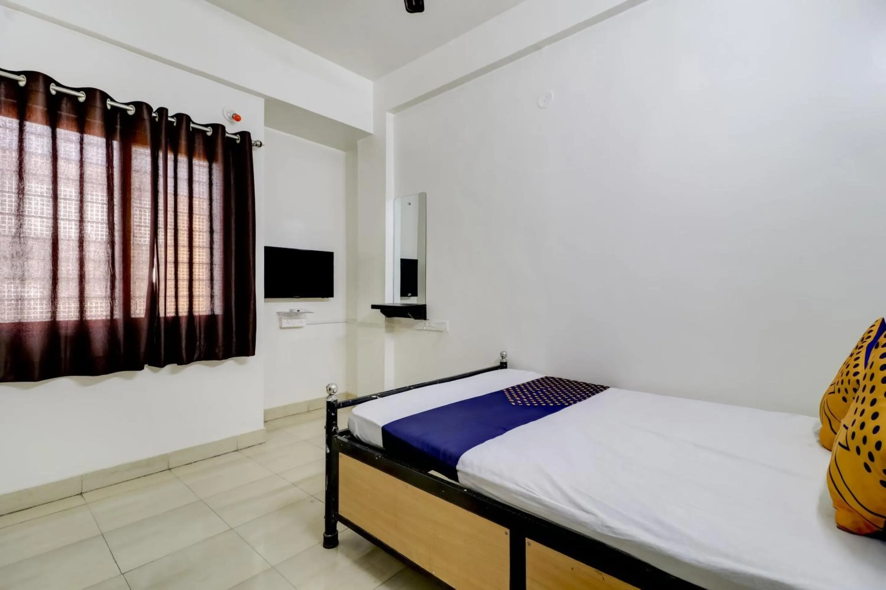 Bedroom in Hotel O Royal Rest Rooms