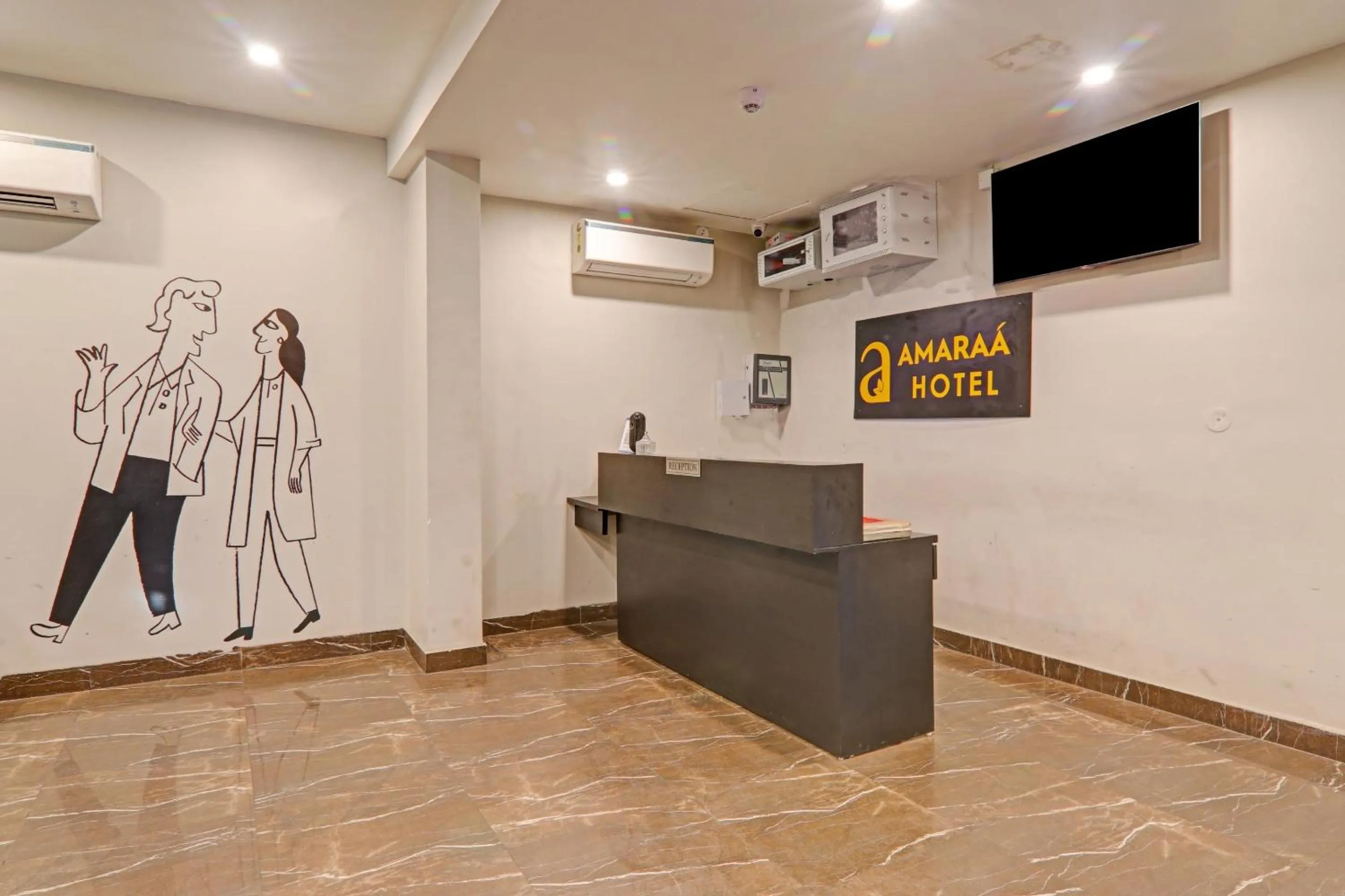 Lobby or reception in Super Townhouse Amaraa Hotel Near Phoenix Palassio