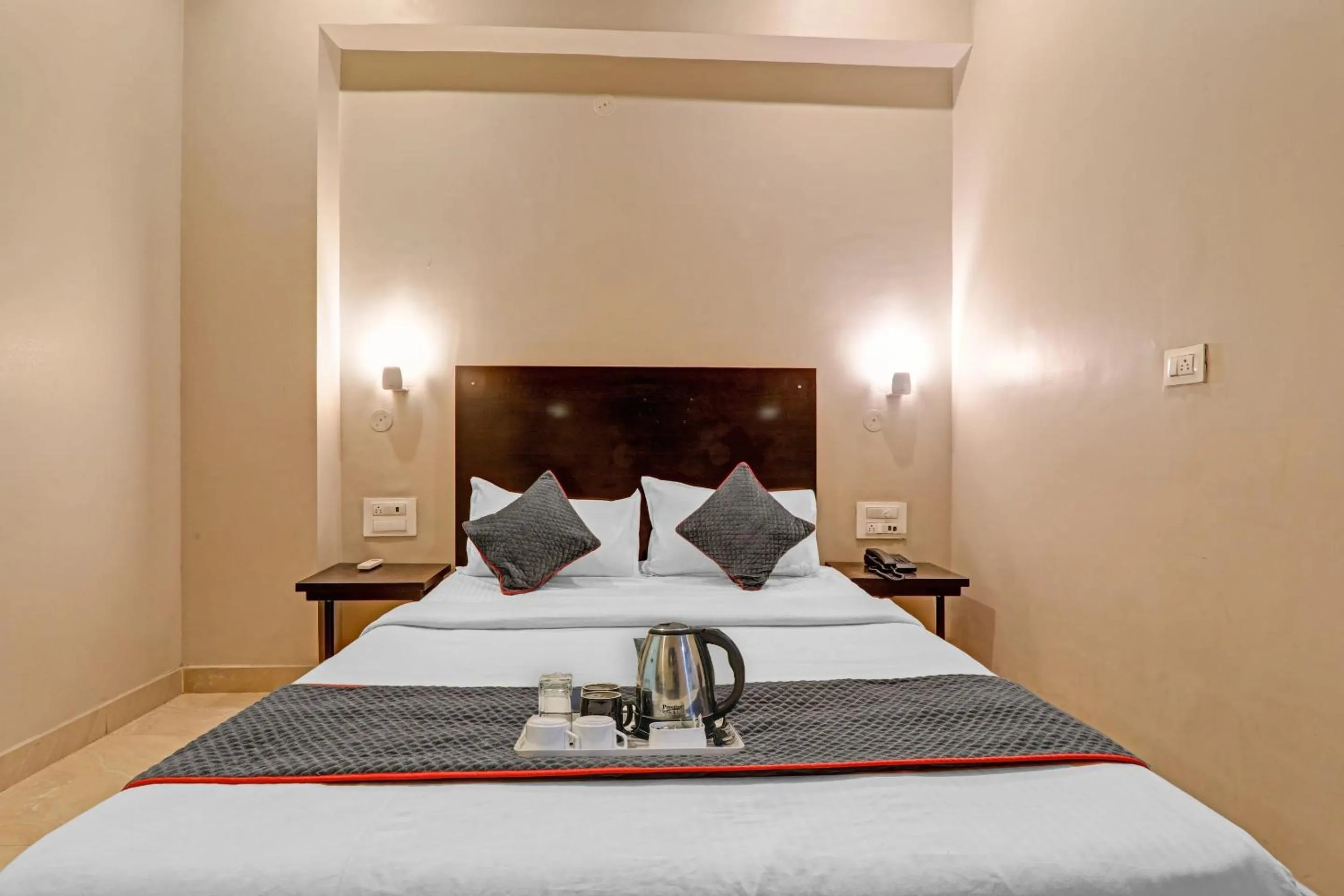 Bedroom in Super Townhouse Amaraa Hotel Near Phoenix Palassio