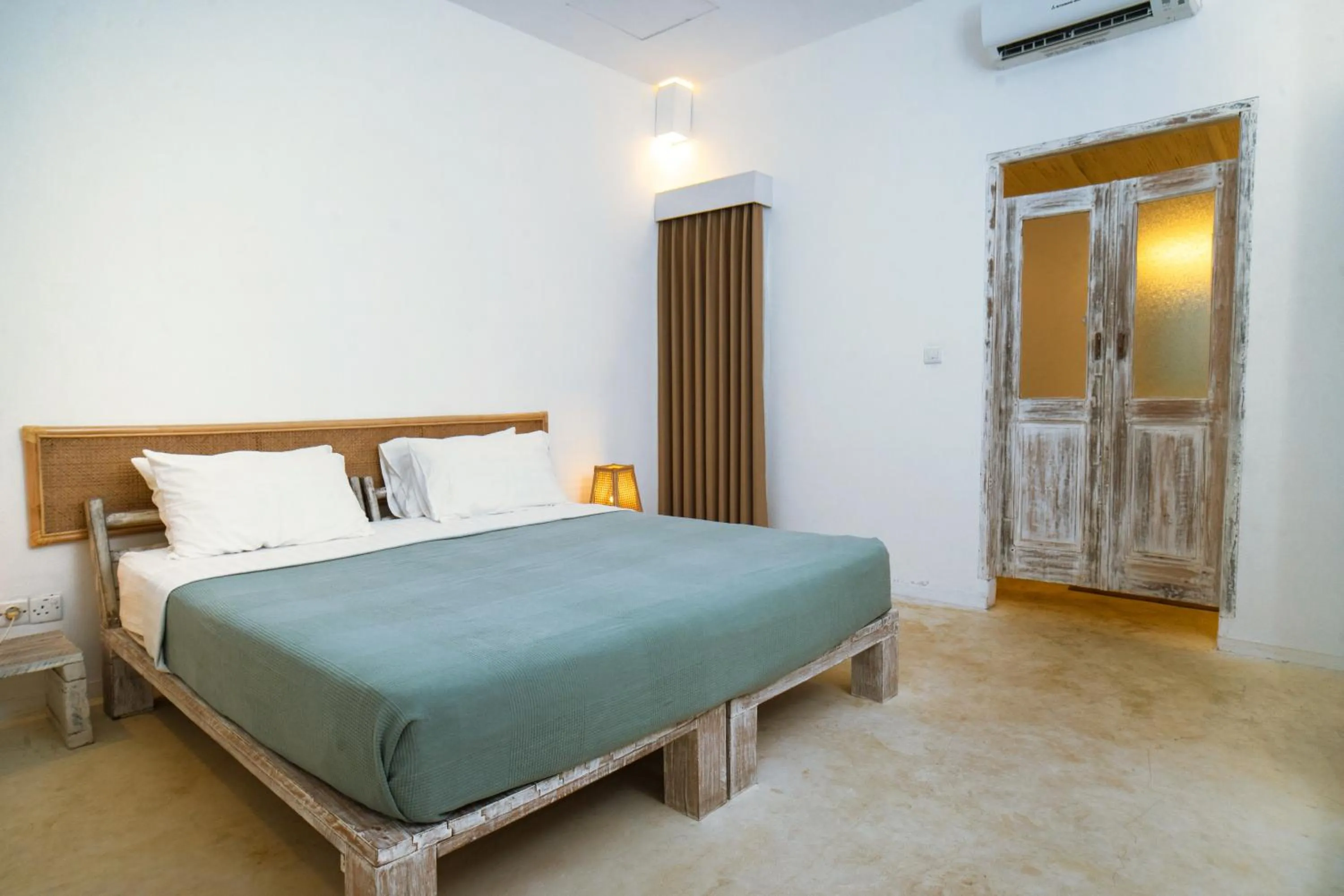 Bed in Trikora Beach Club and Resort