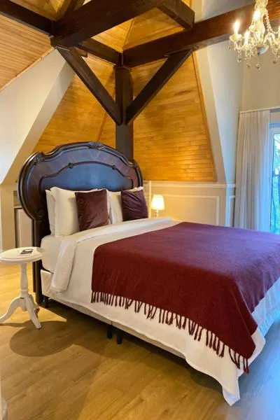 Bed in Castelo Boutique Hotel