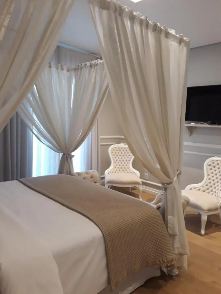 Bed in Castelo Boutique Hotel