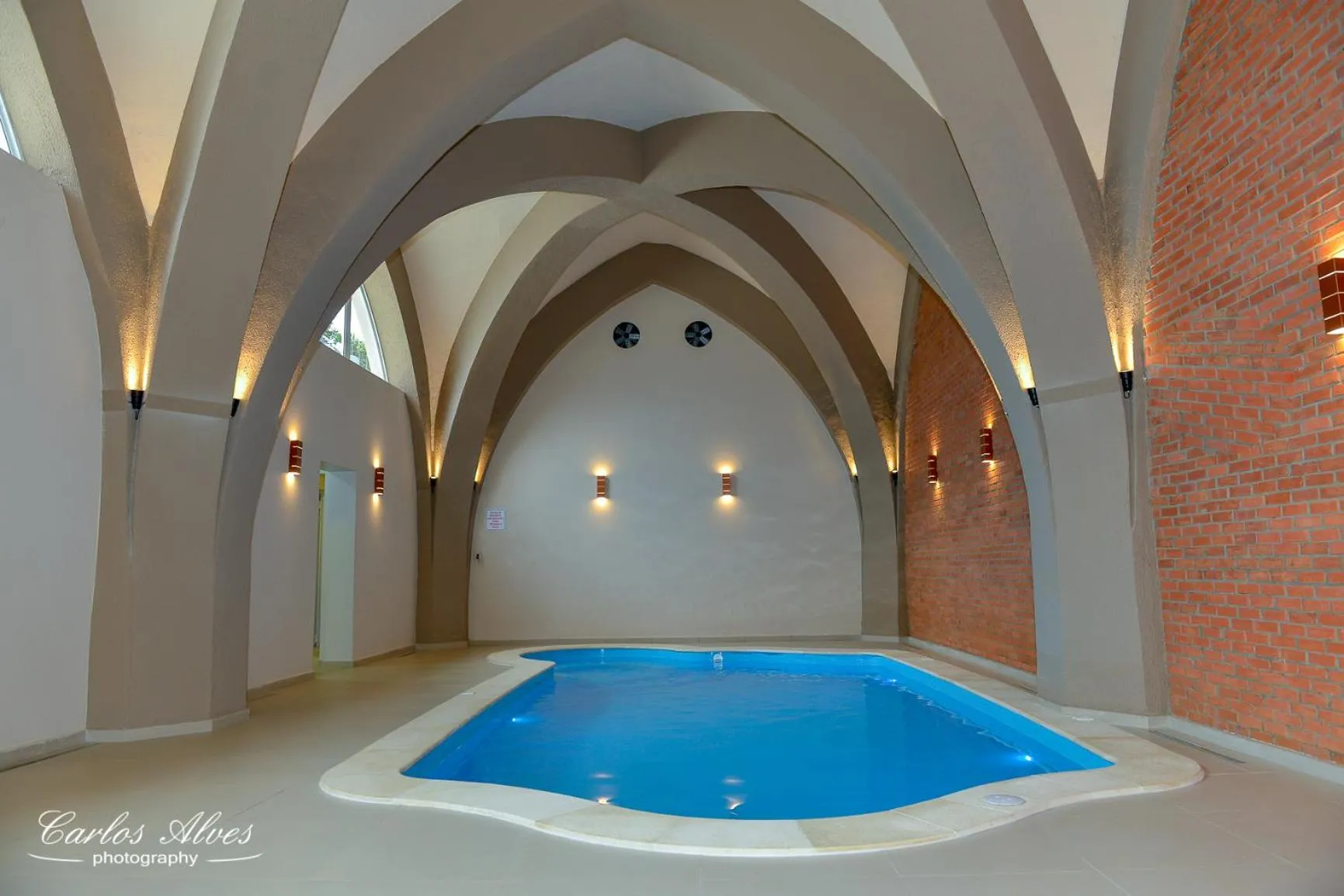 Swimming pool in Castelo Boutique Hotel