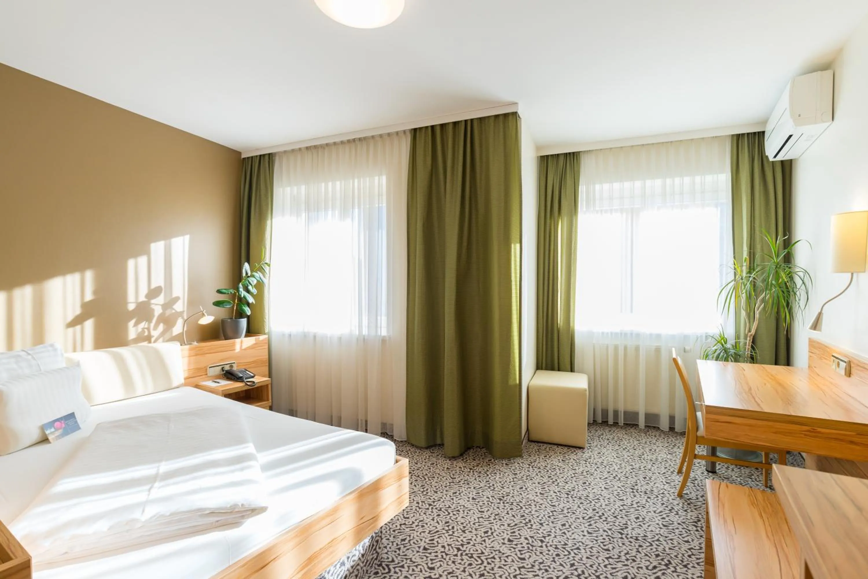 Photo of the whole room, Bed in Hotel Süd Graz