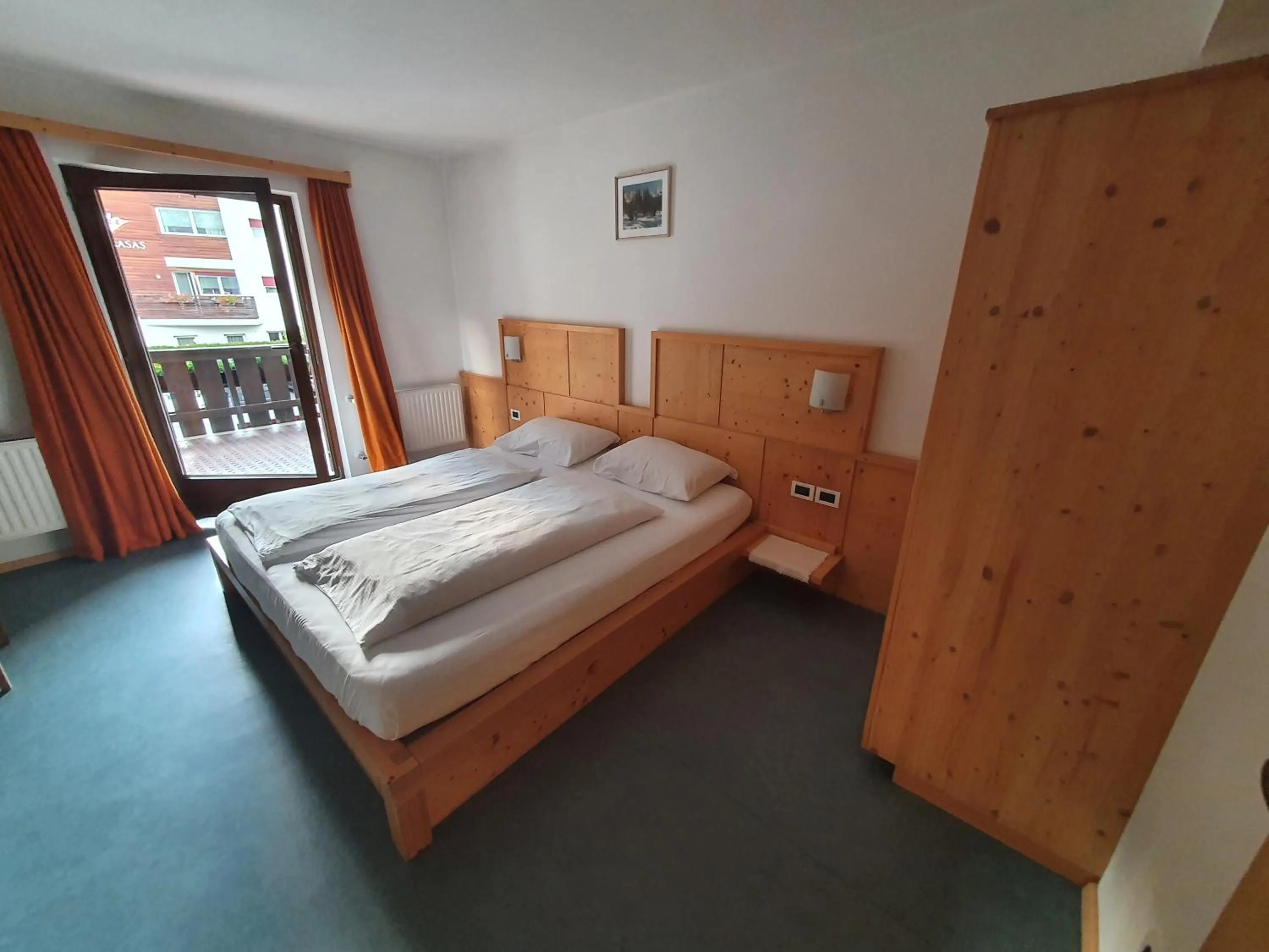 Bed in ALBERGO BAR RISTORANTE DOLOMIA