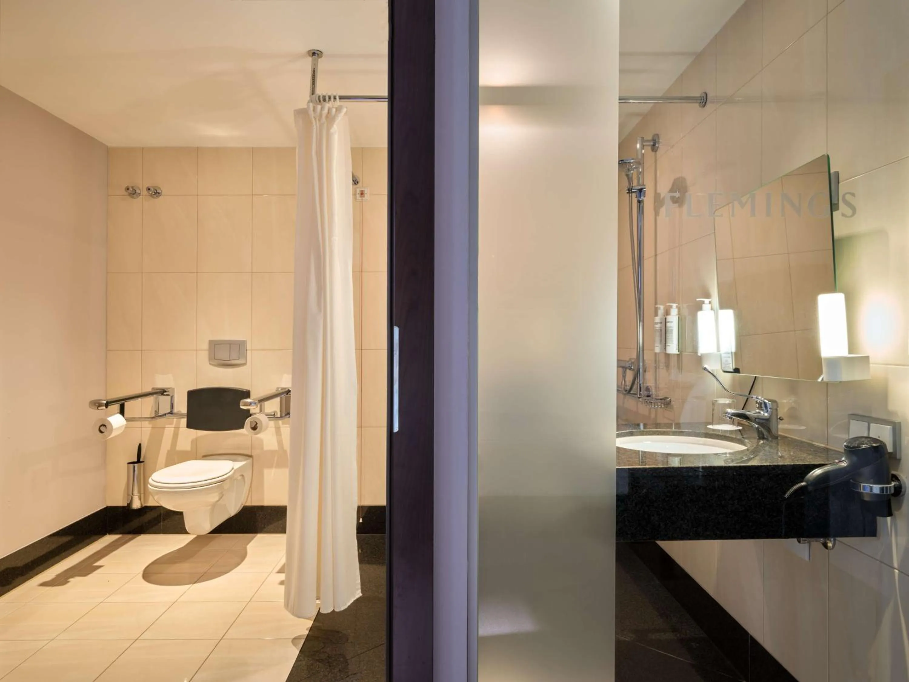 Bathroom in Flemings Hotel Wien-Stadthalle