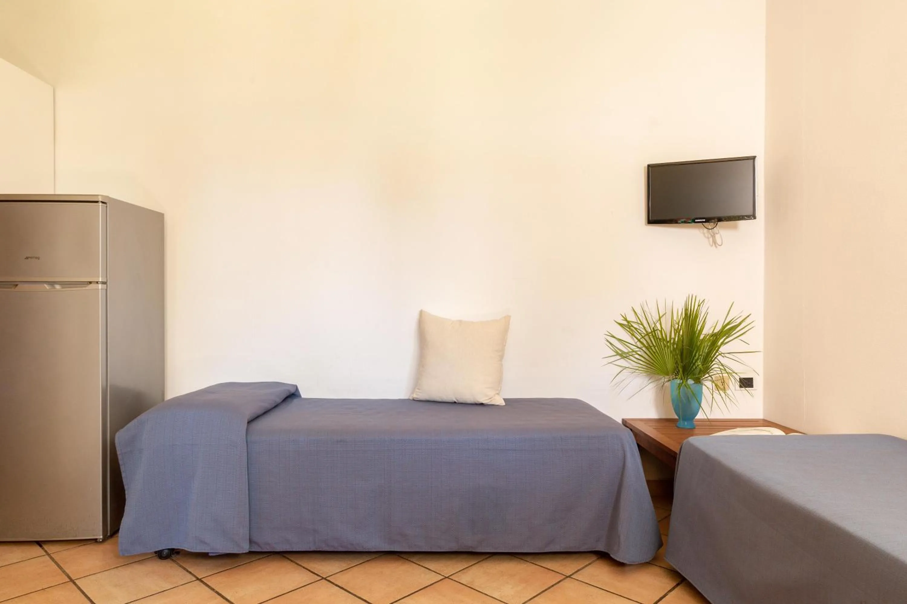 Photo of the whole room, Bed in Gitavillage Argentario