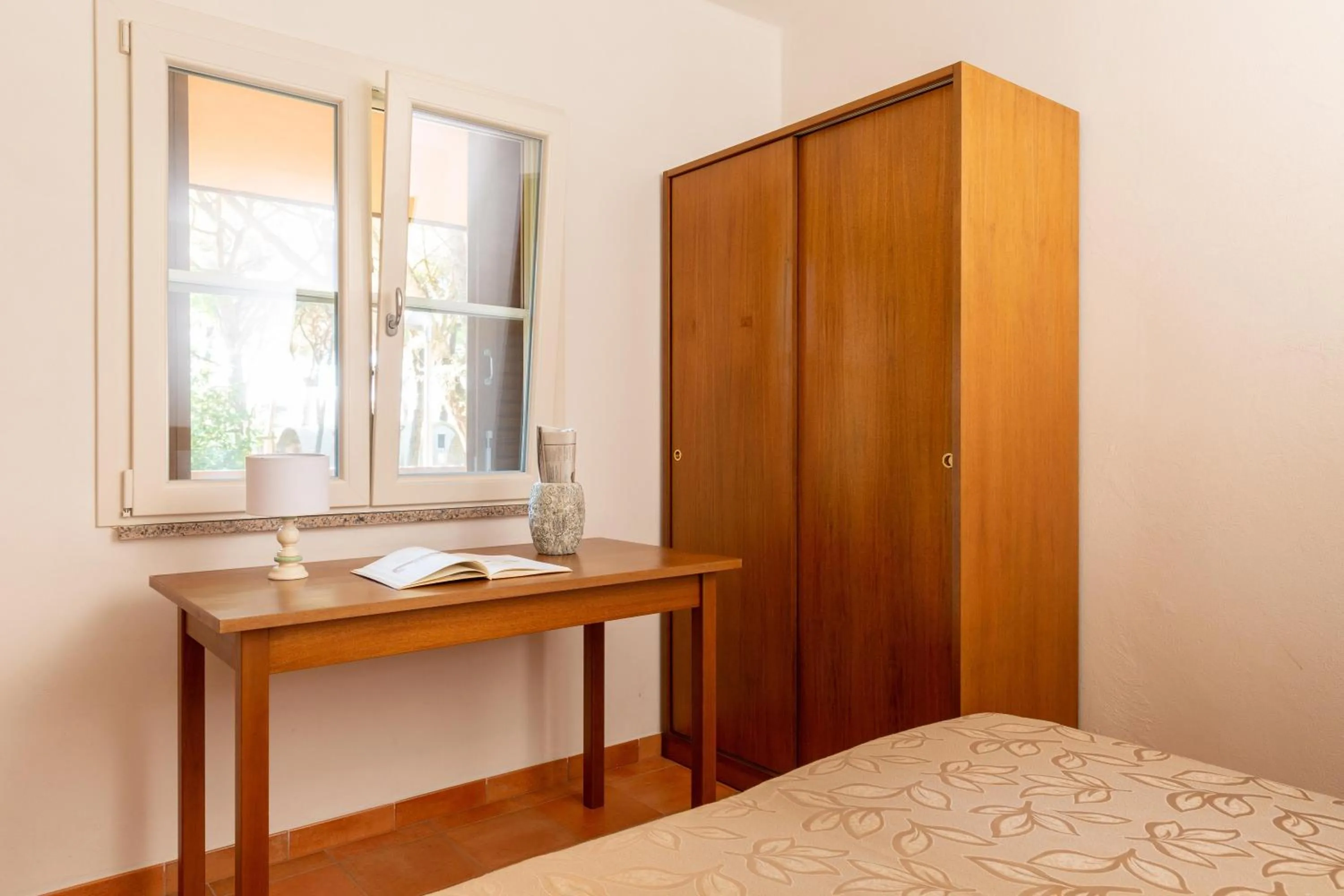 Photo of the whole room, Bed in Gitavillage Argentario