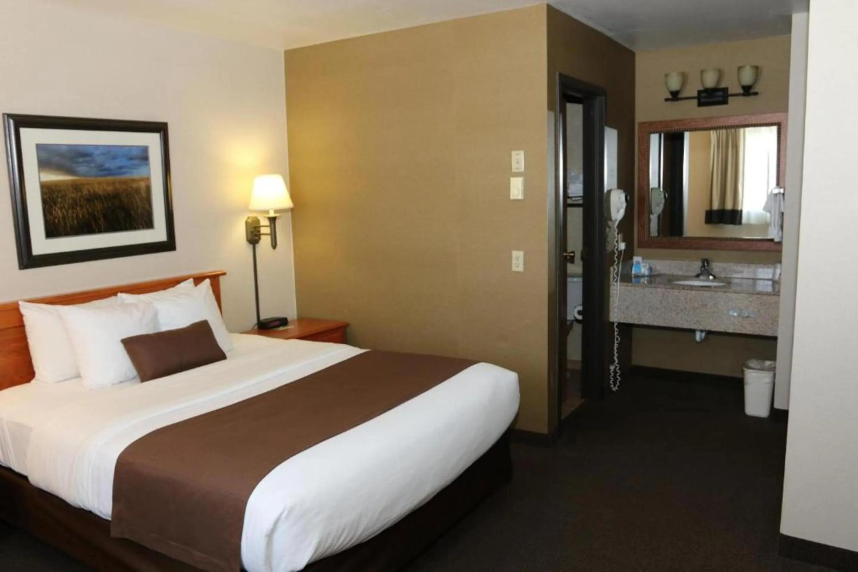 Bedroom, Bed in Studio 6 - Minot, ND