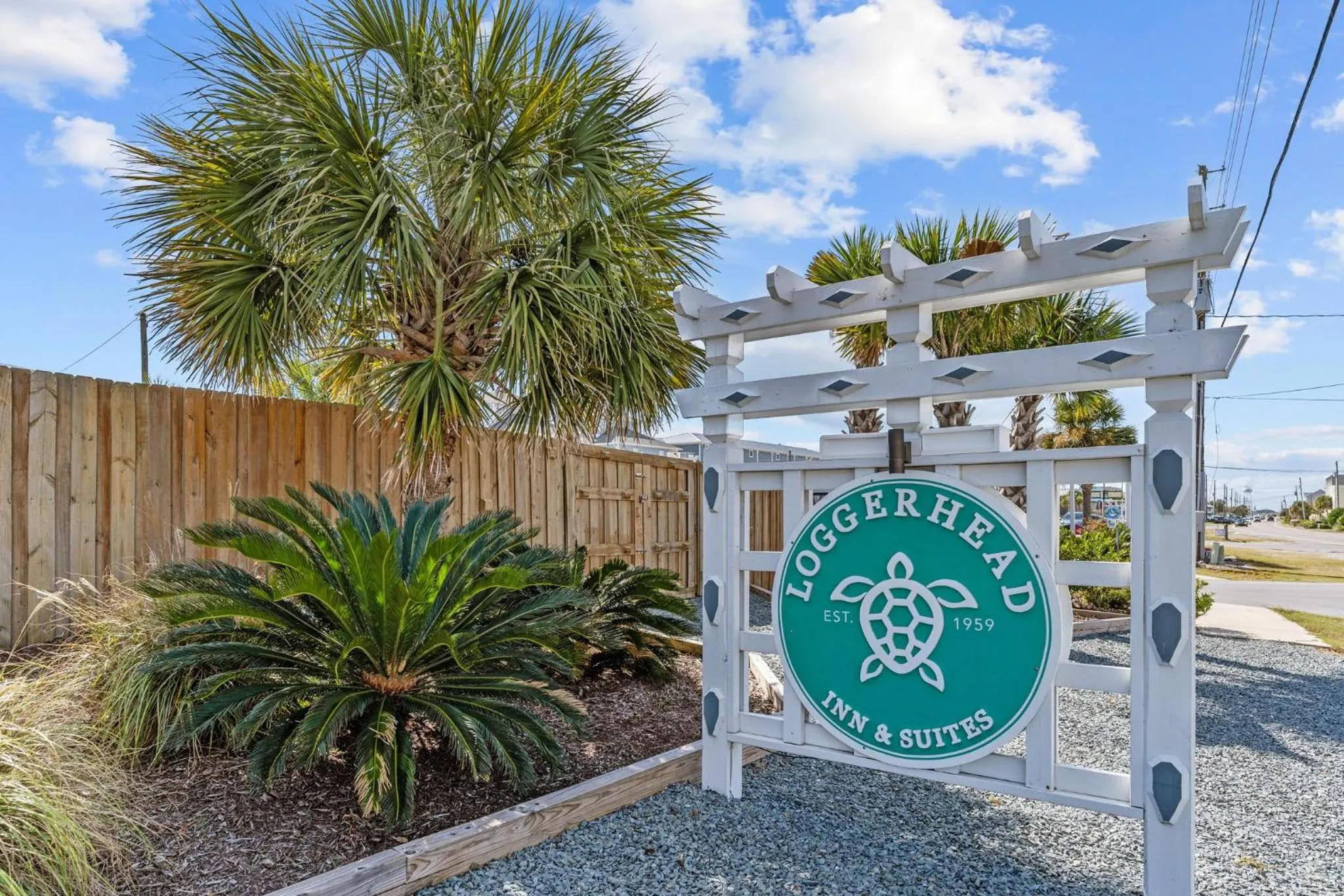 Logo/Certificate/Sign in Loggerhead Inn and Suites