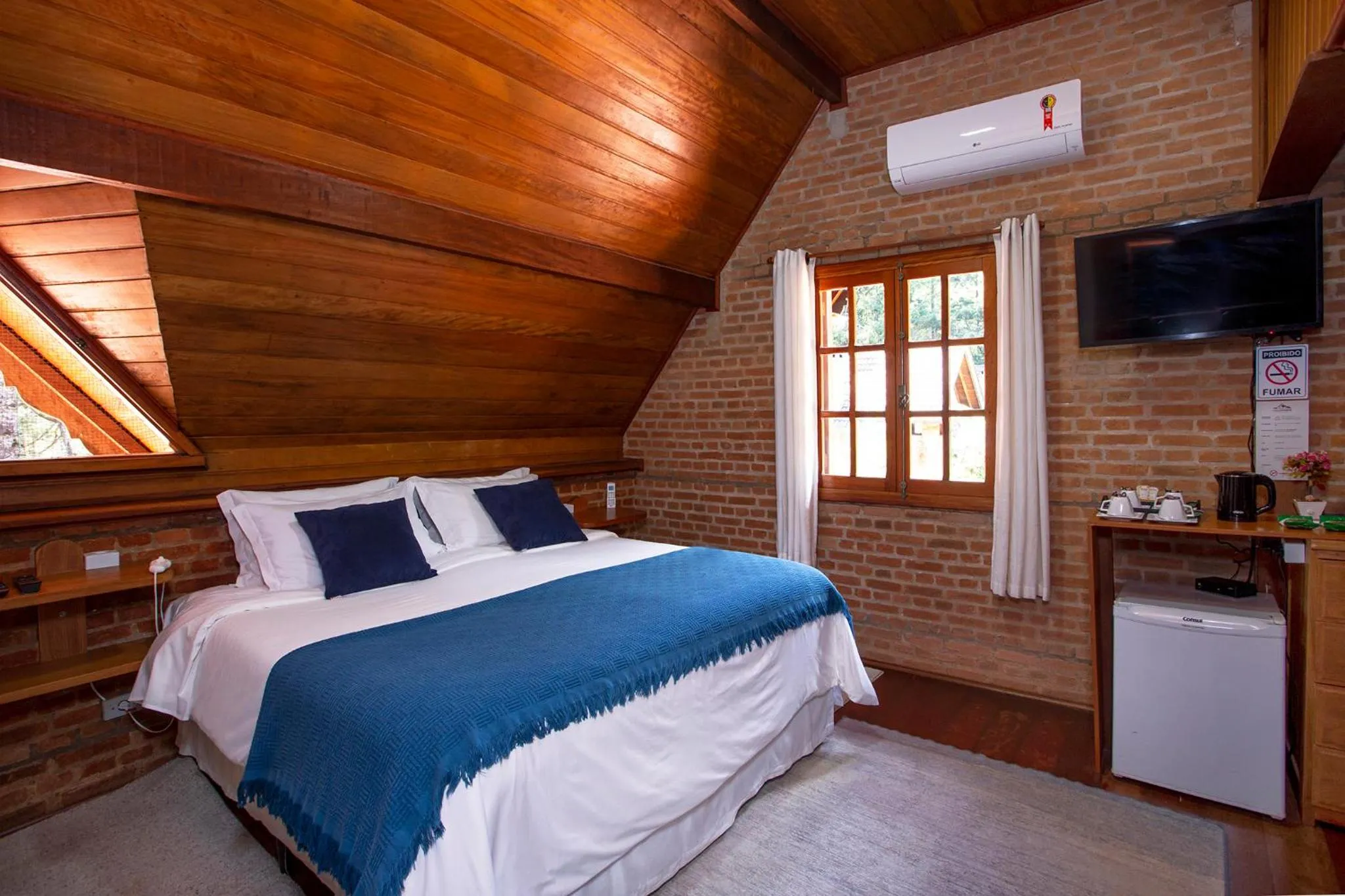 TV and multimedia, Bed in Pousada Suiça Mineira Garden